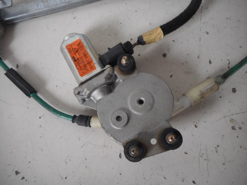 Alzacristallo elettr. porta post. con motorino  sx.