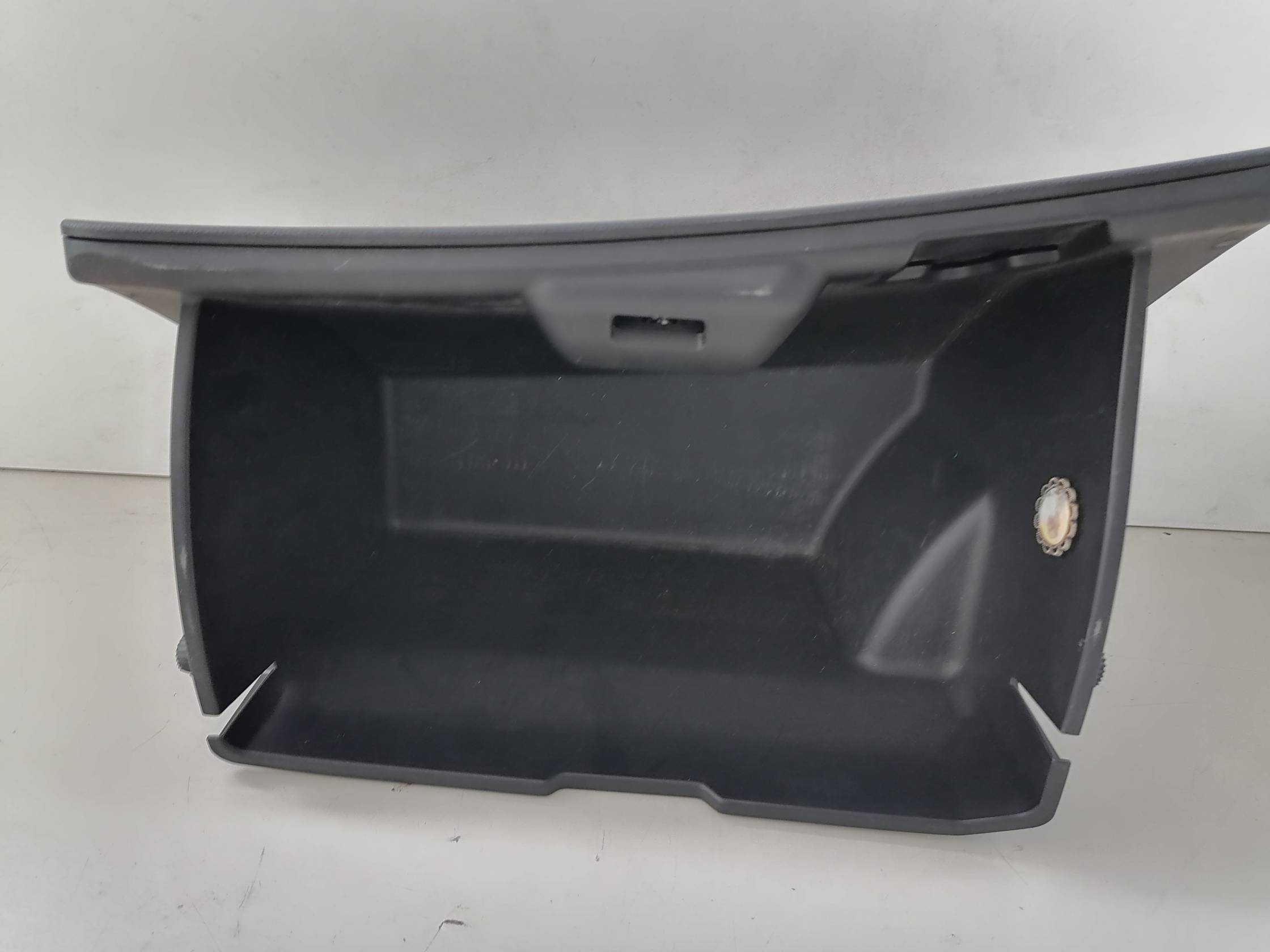 Portaoggetti cruscotto dx.