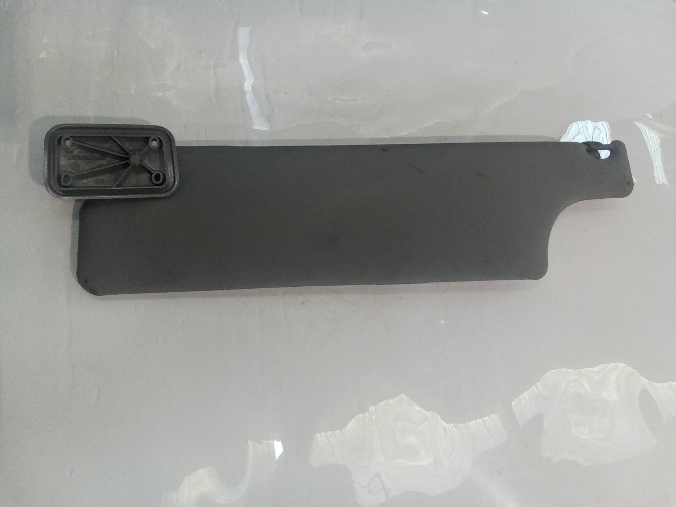 Aletta parasole parabrezza dx.