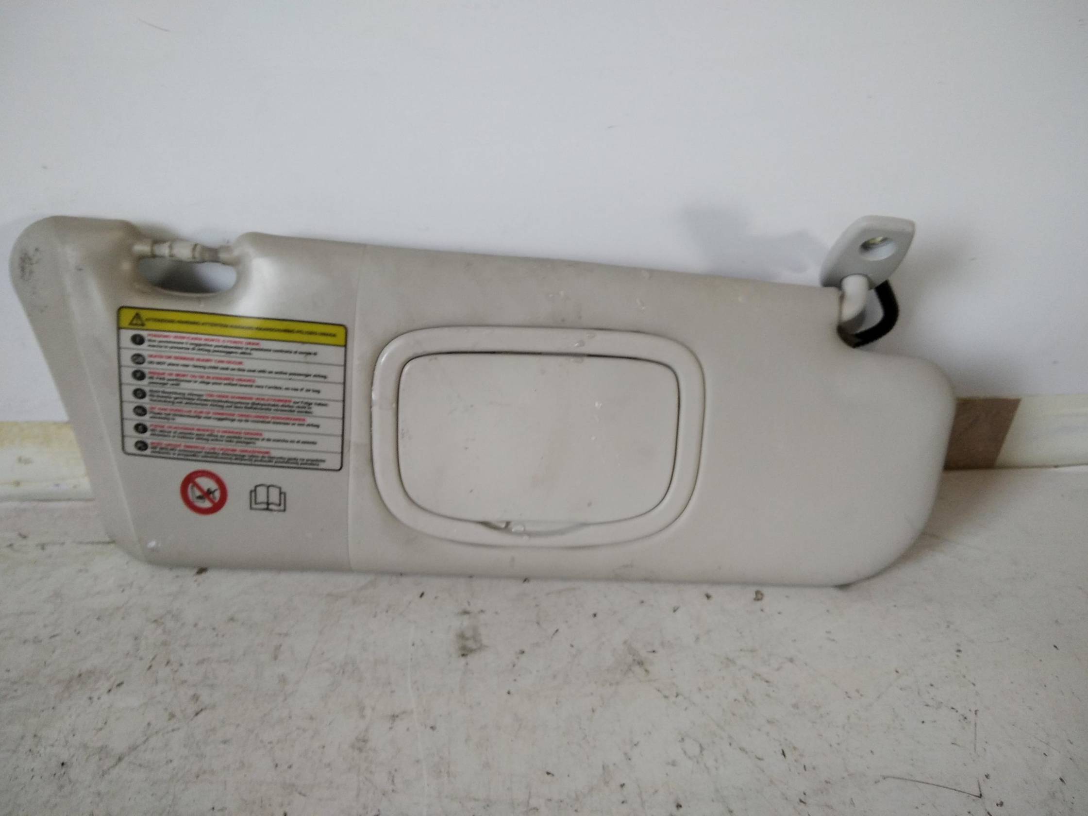 Aletta parasole parabrezza dx.