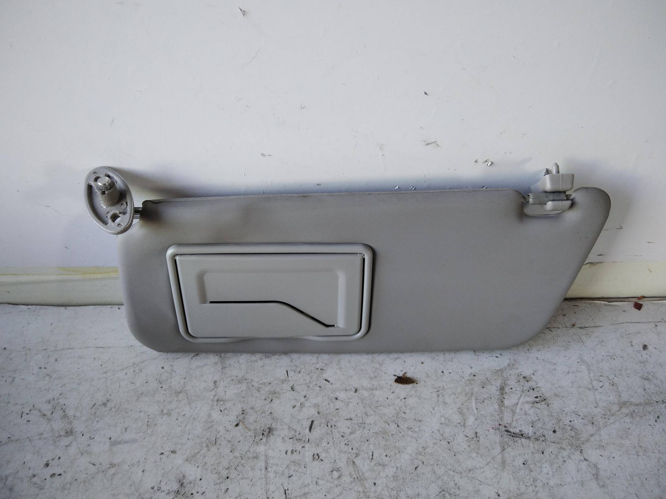 Aletta parasole parabrezza sx.