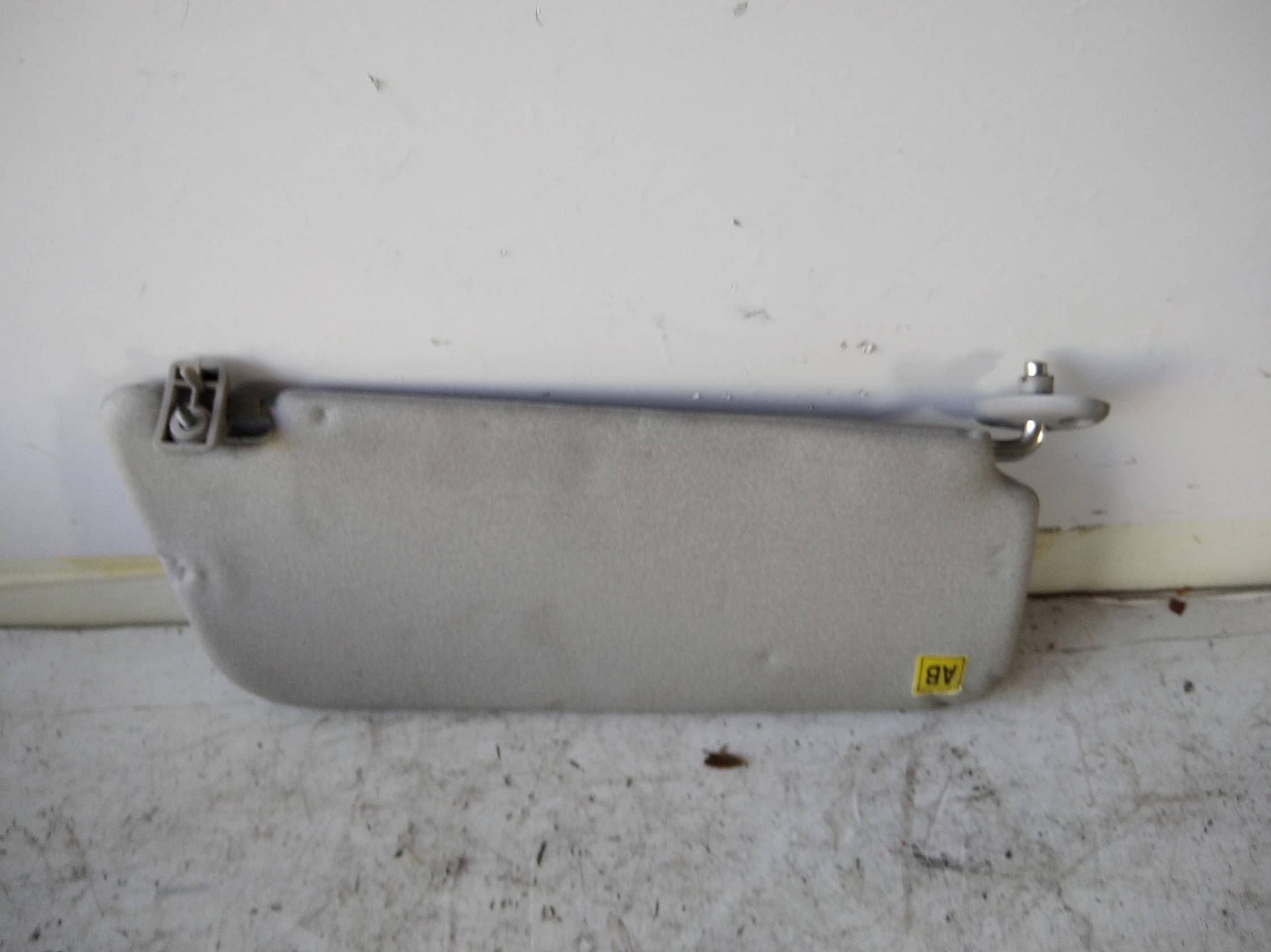 Aletta parasole parabrezza sx.