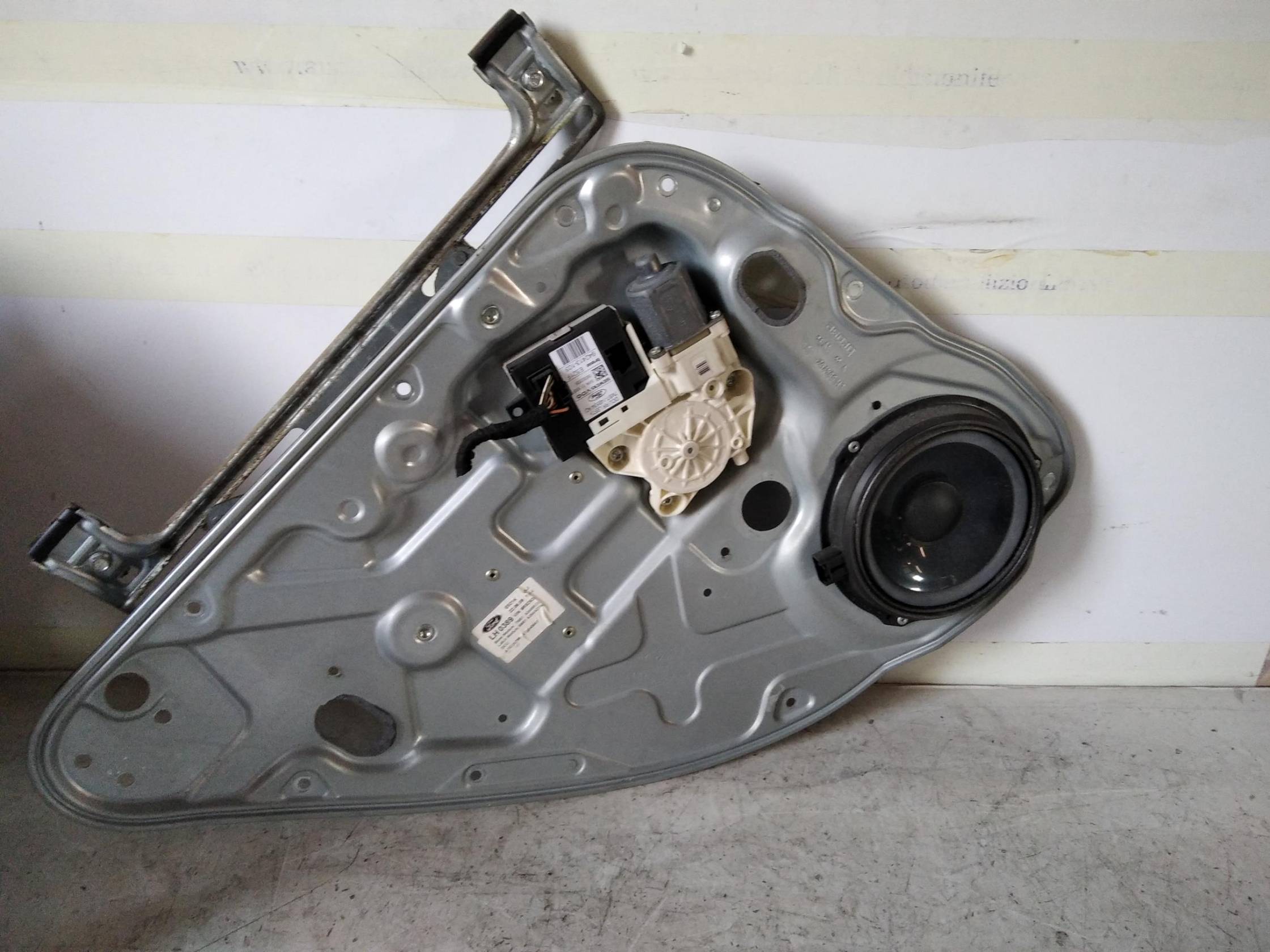 Alzacristallo elettr. porta post. sx.