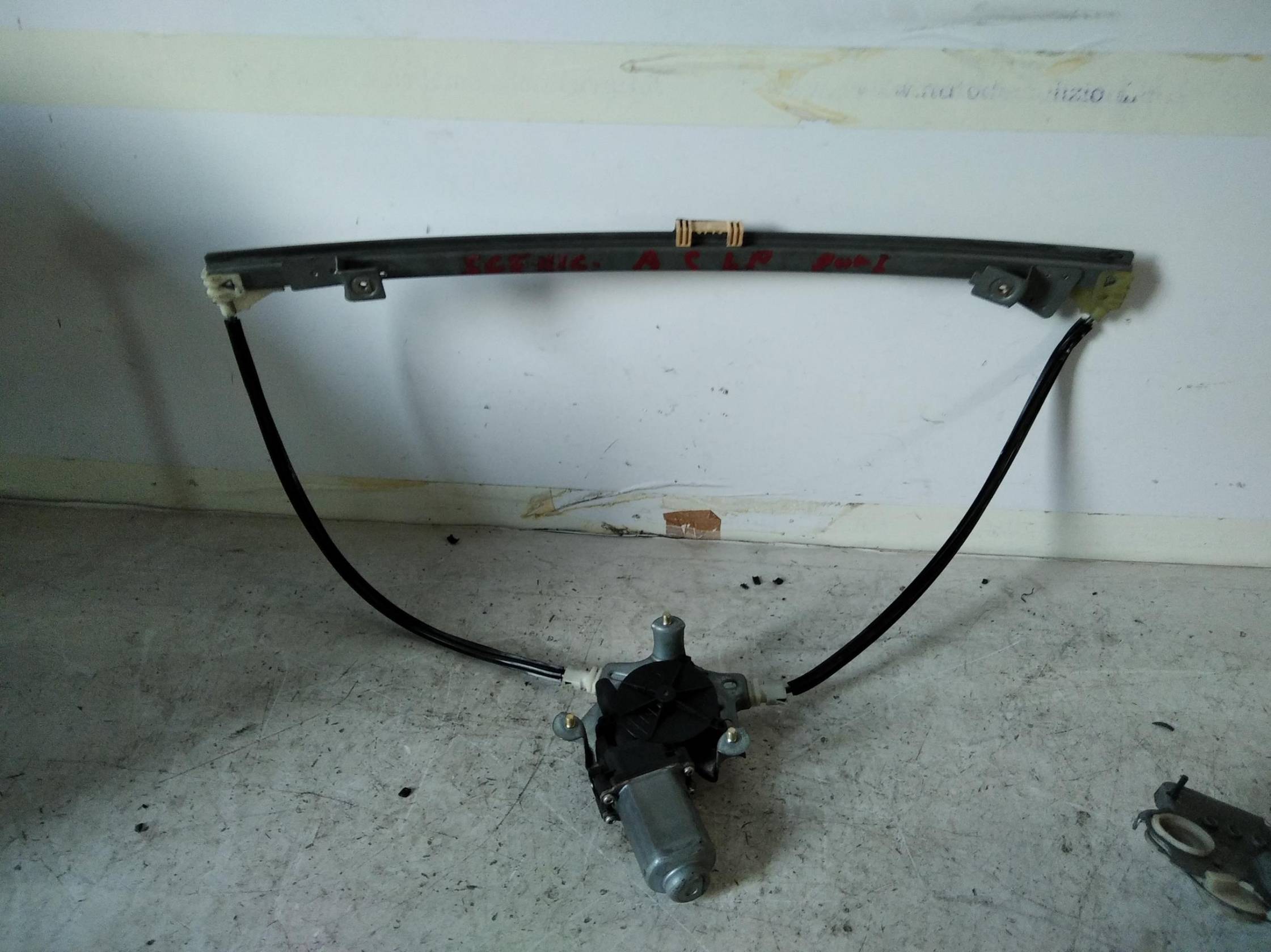 Alzacristallo elettr. porta ant. con motorino sx.