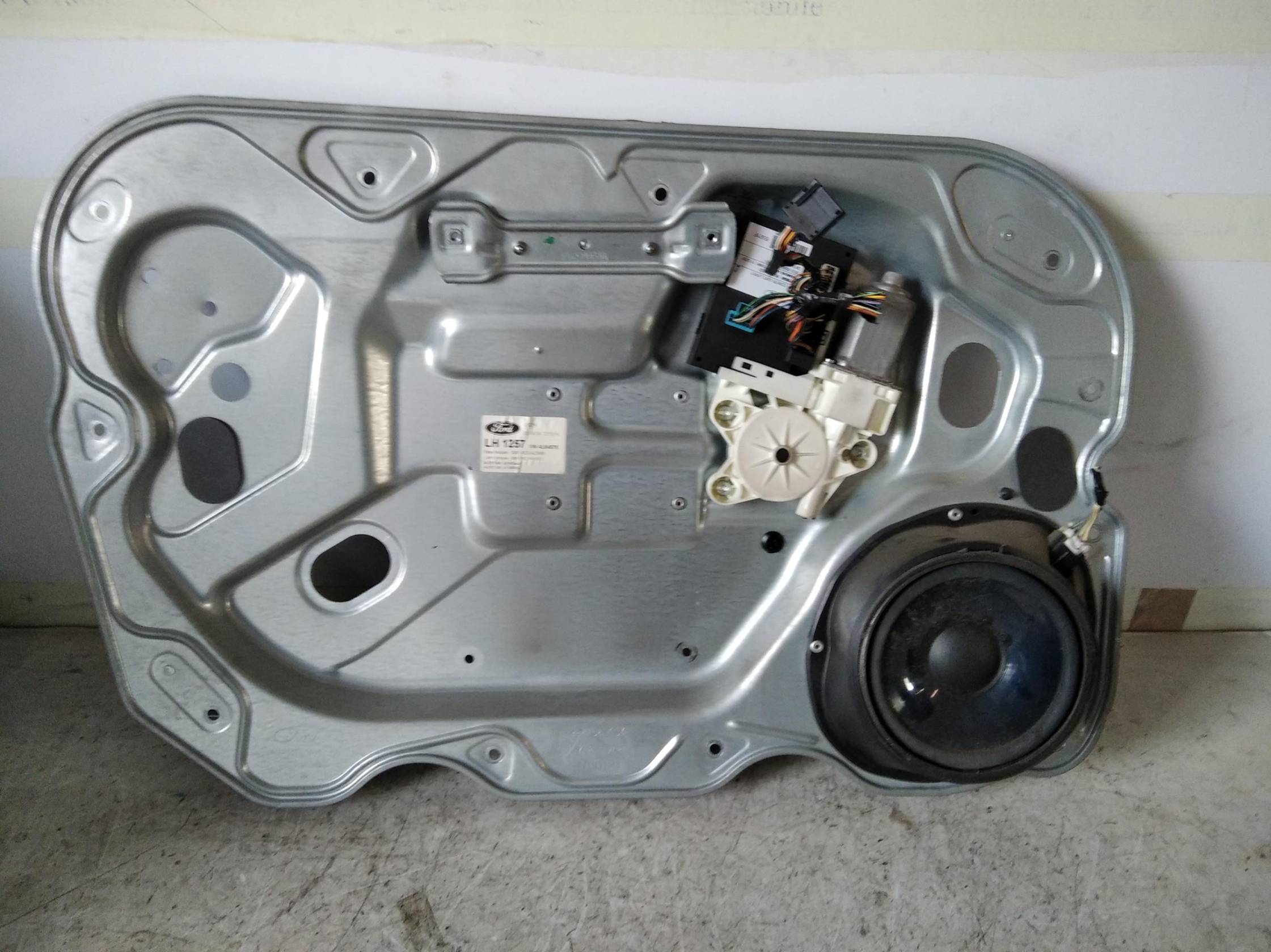 Alzacristallo elettr. porta ant. sx.