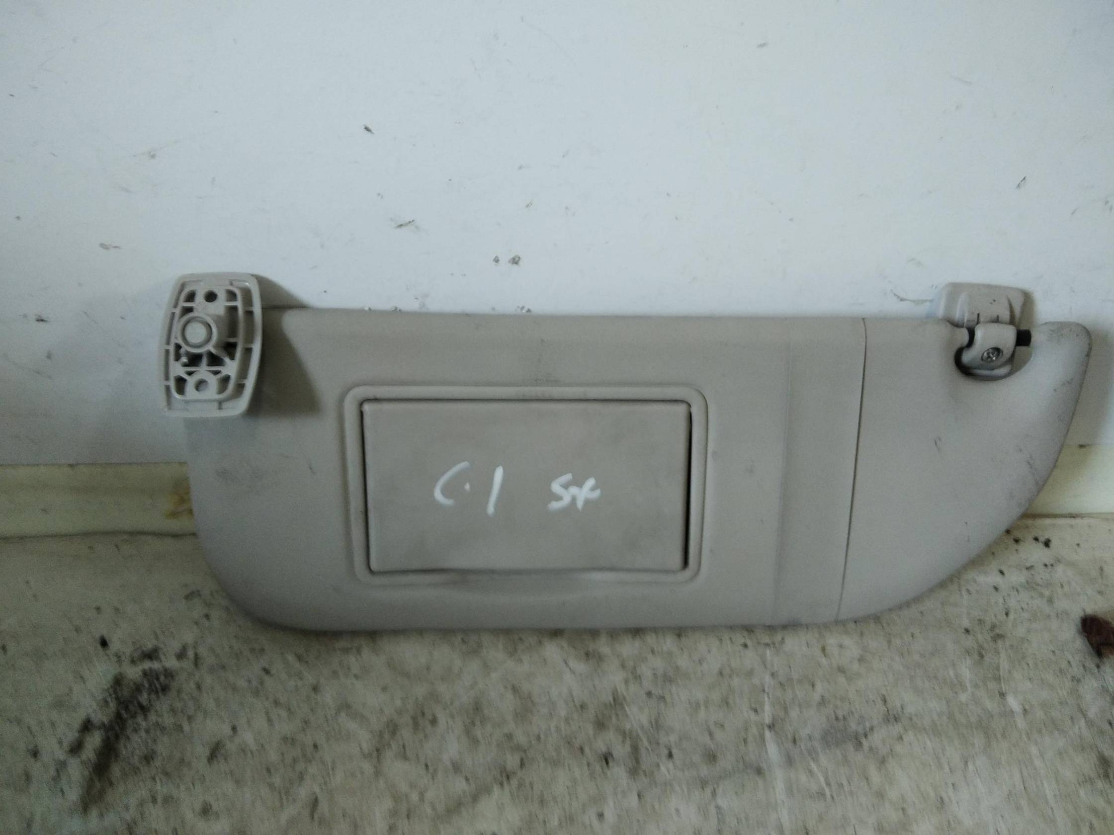 Aletta parasole parabrezza sx.