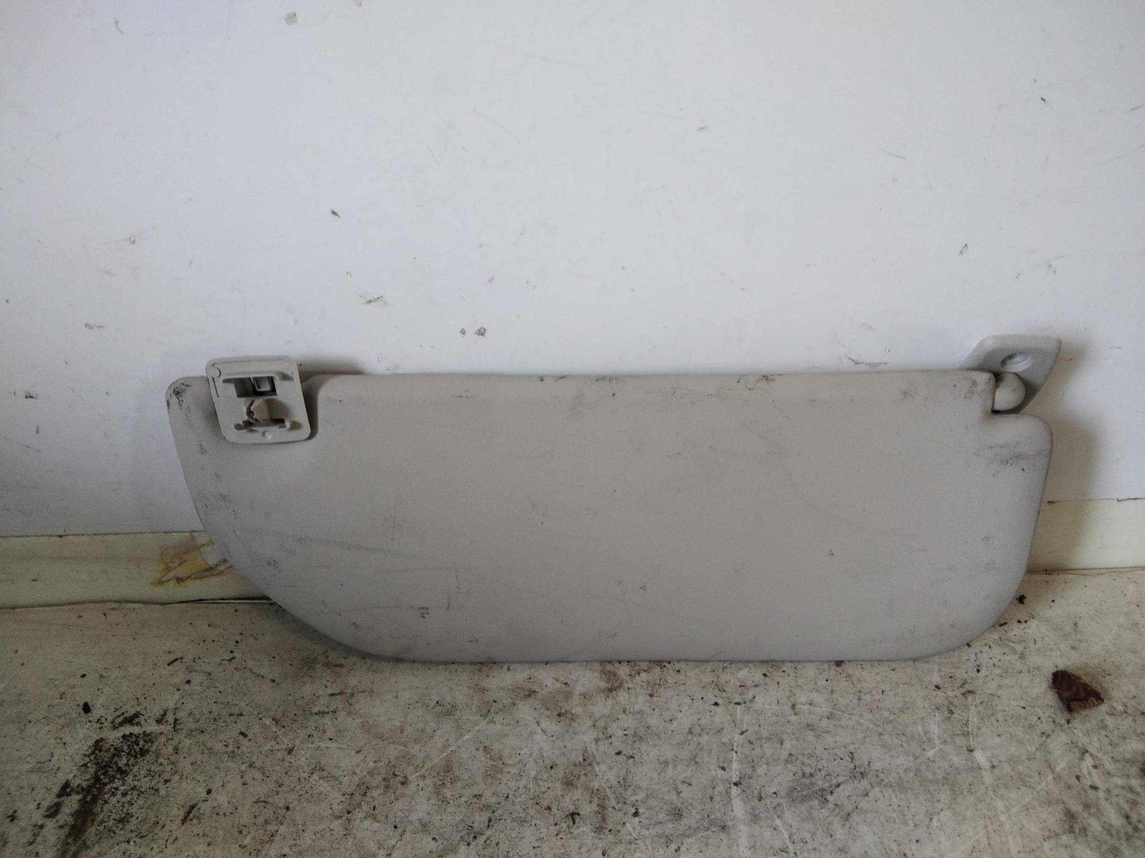 Aletta parasole parabrezza sx.