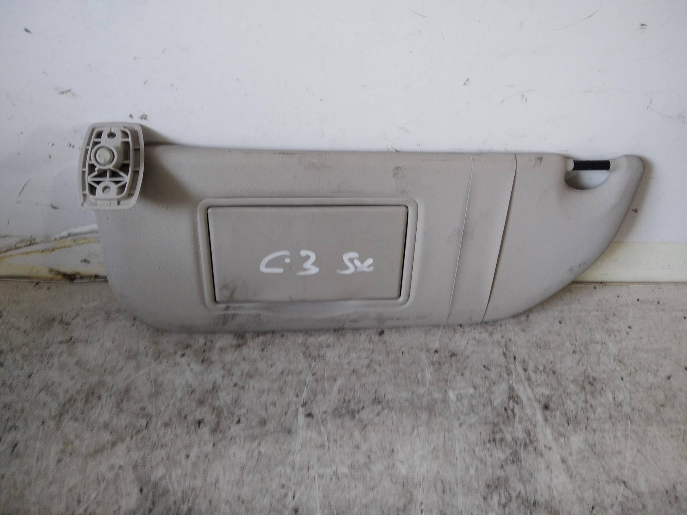 Aletta parasole parabrezza sx.