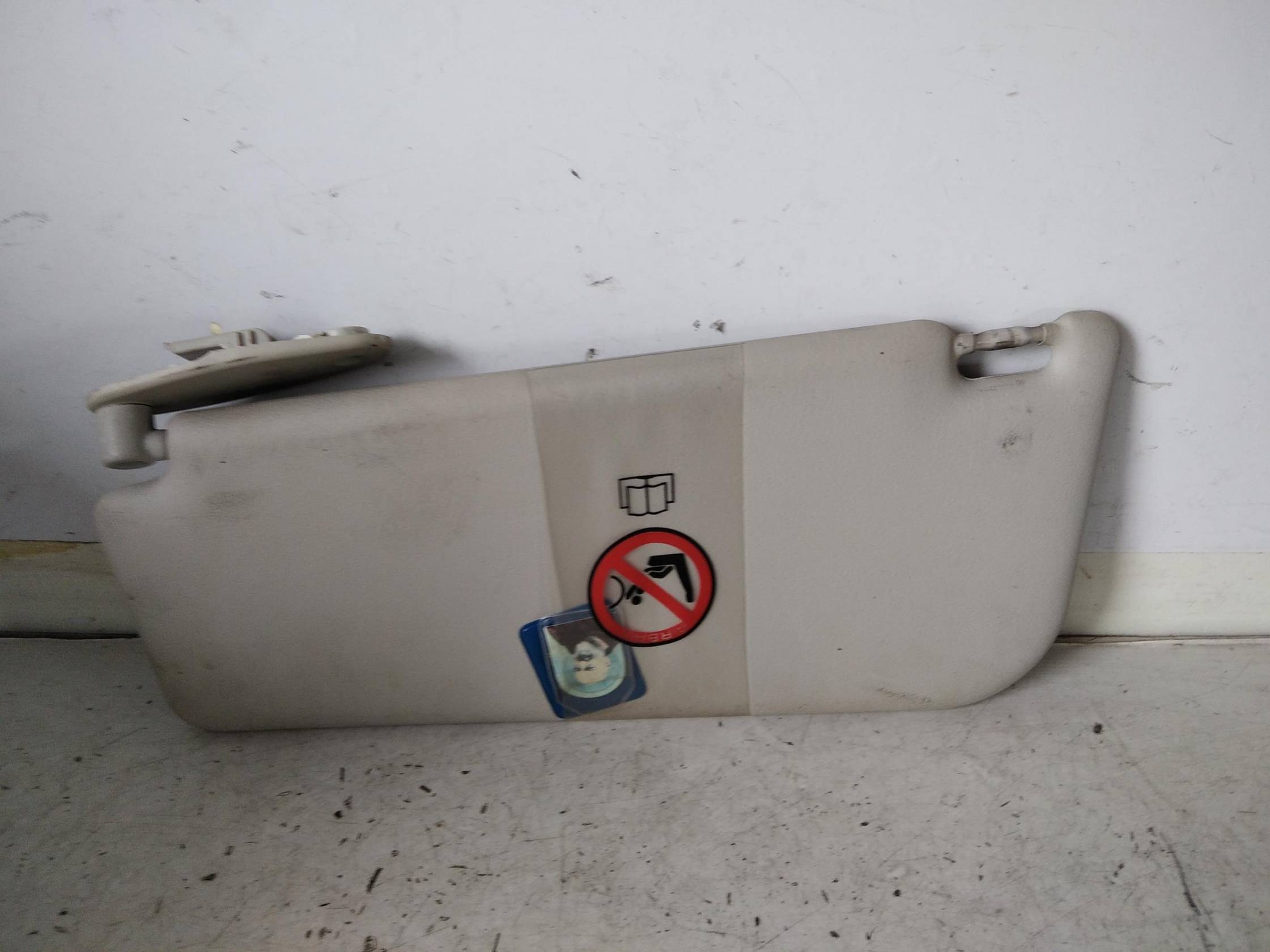 Aletta parasole parabrezza dx.