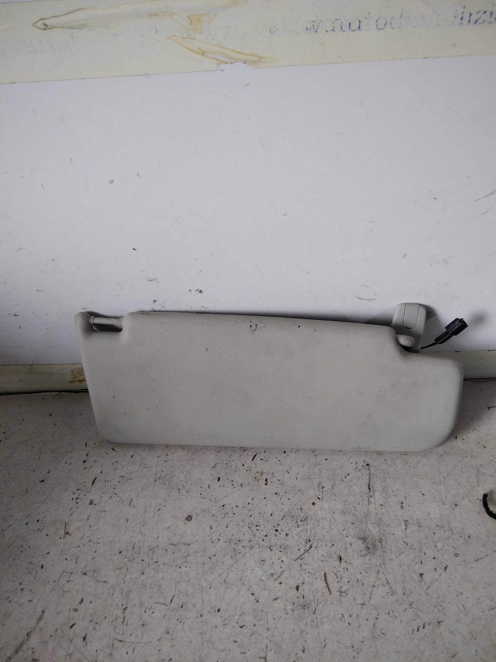 Aletta parasole parabrezza sx.