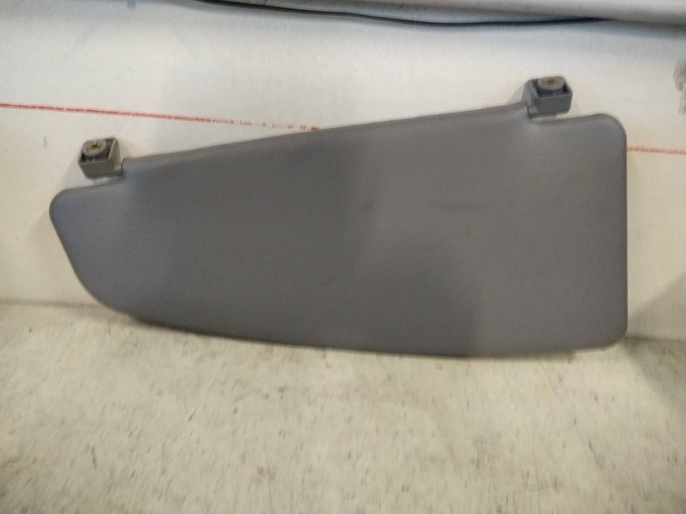 Aletta parasole parabrezza sx.