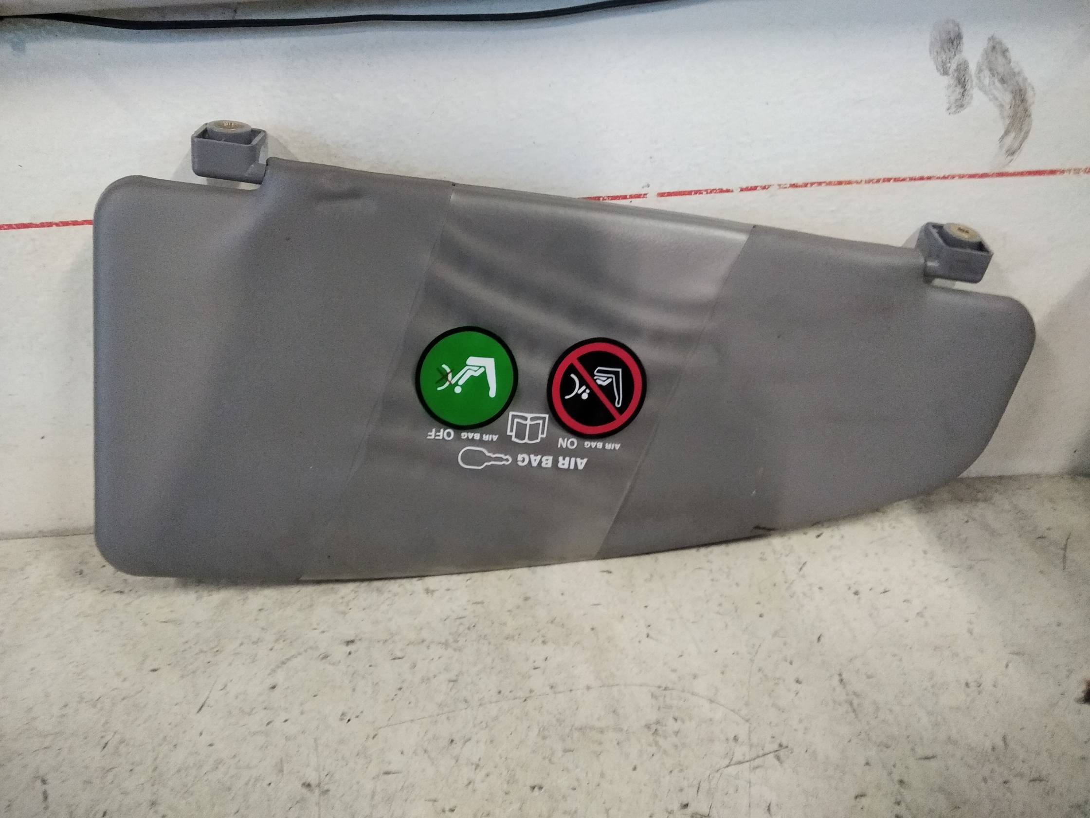 Aletta parasole parabrezza dx.