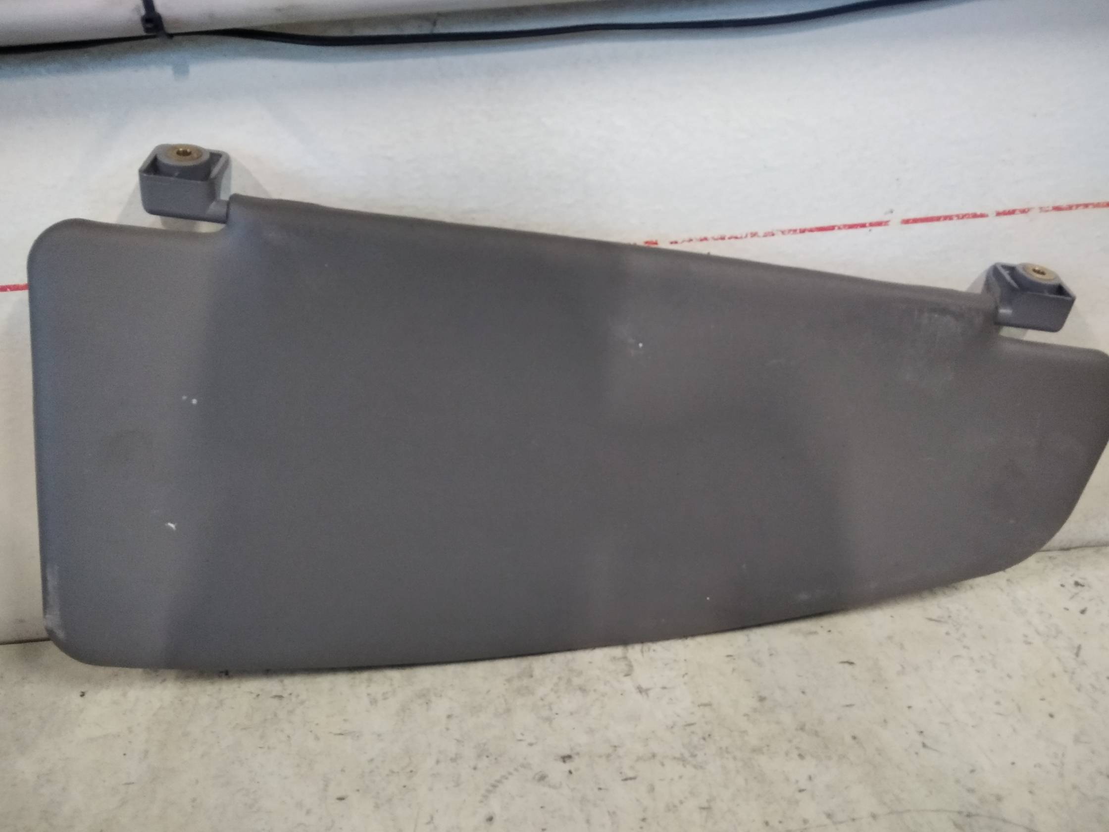 Aletta parasole parabrezza sx.