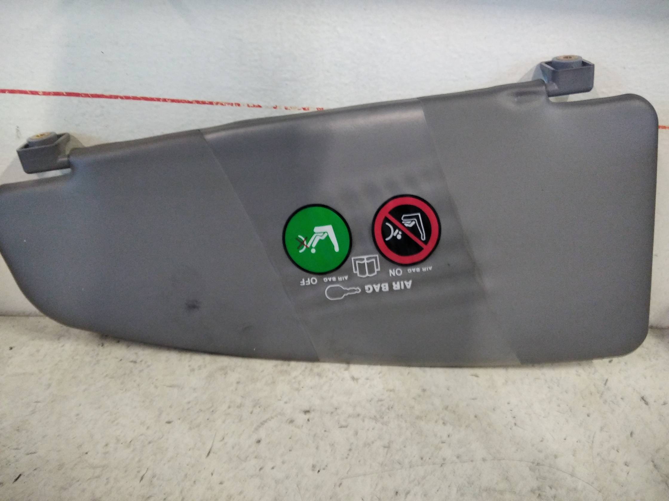 Aletta parasole parabrezza dx.