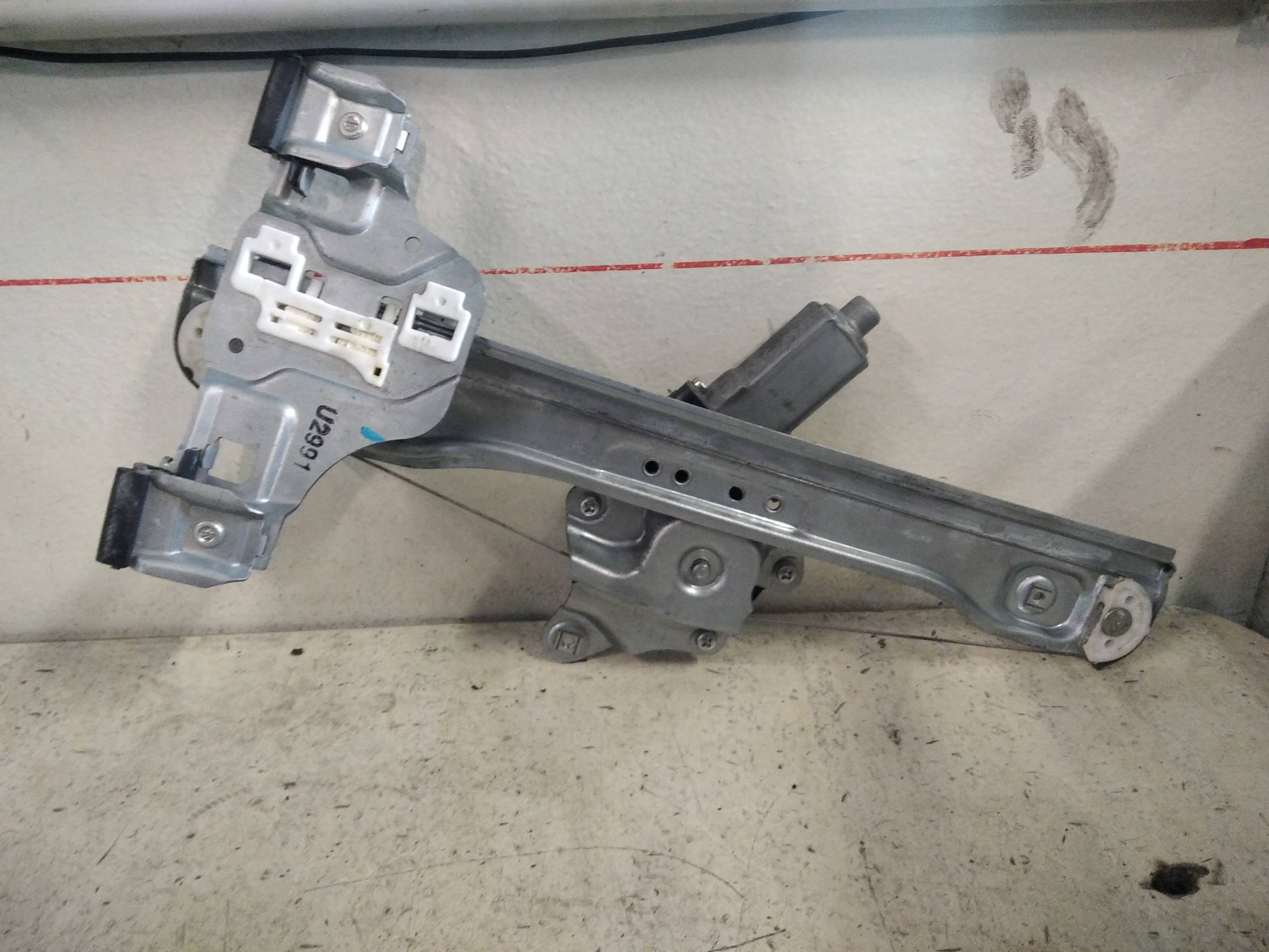 Alzacristallo elettr. porta post. sx.