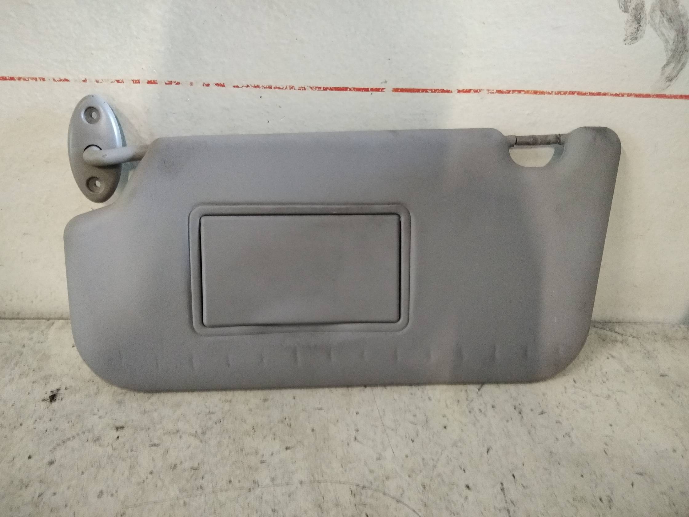 Aletta parasole parabrezza sx.