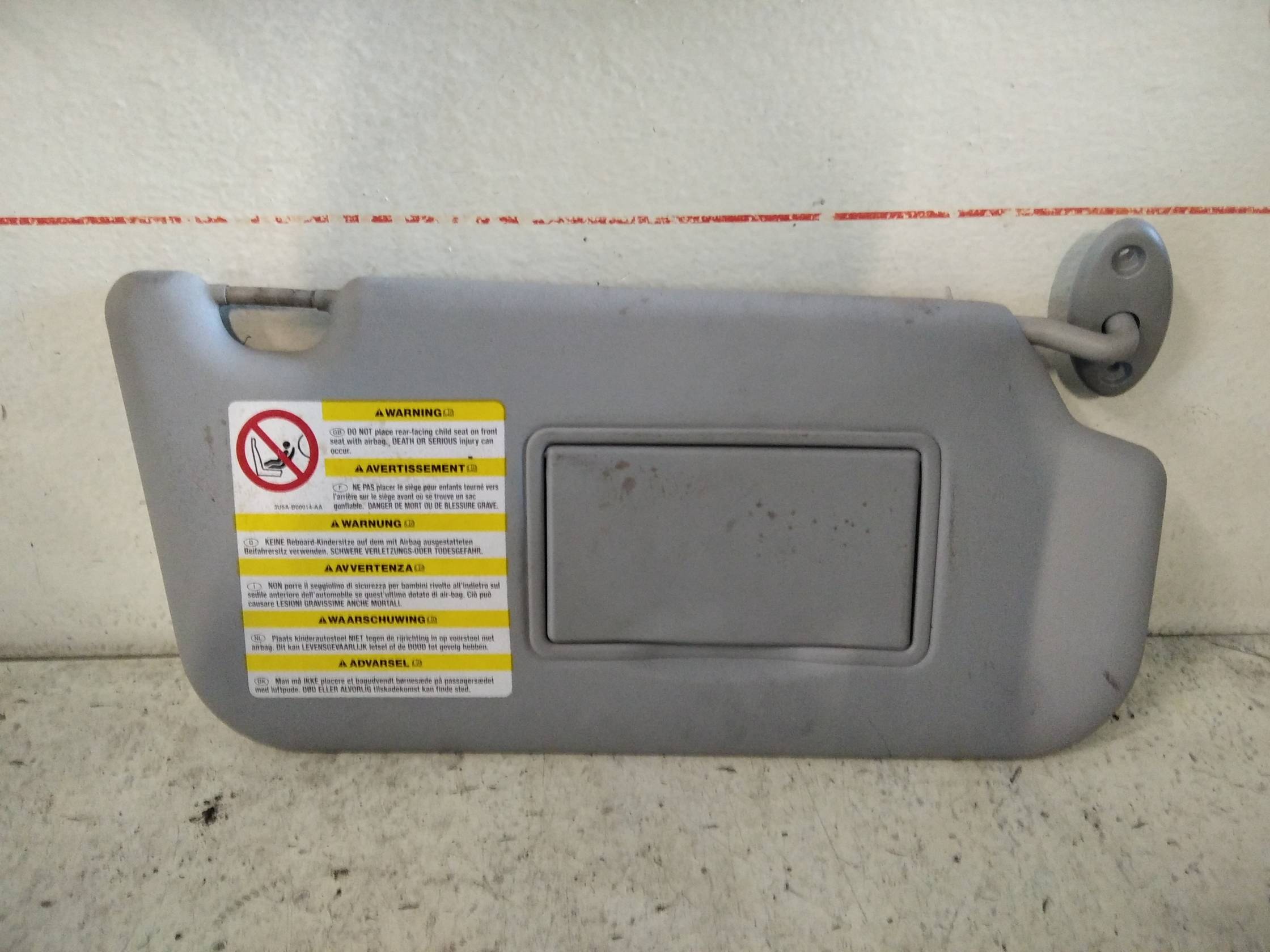 Aletta parasole parabrezza dx.