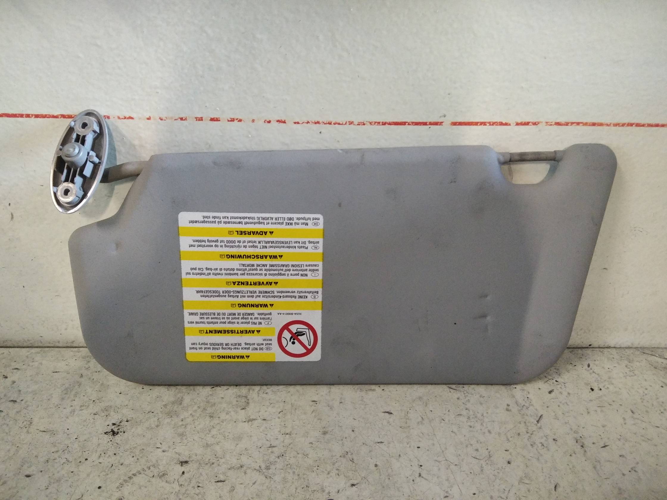 Aletta parasole parabrezza dx.