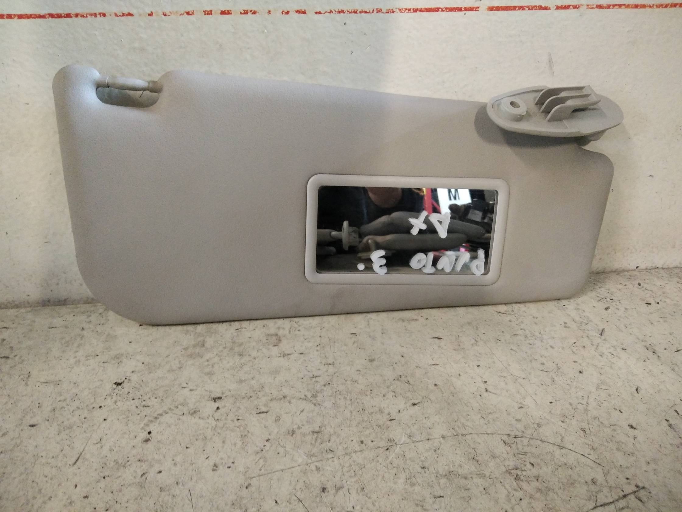 Aletta parasole parabrezza dx.