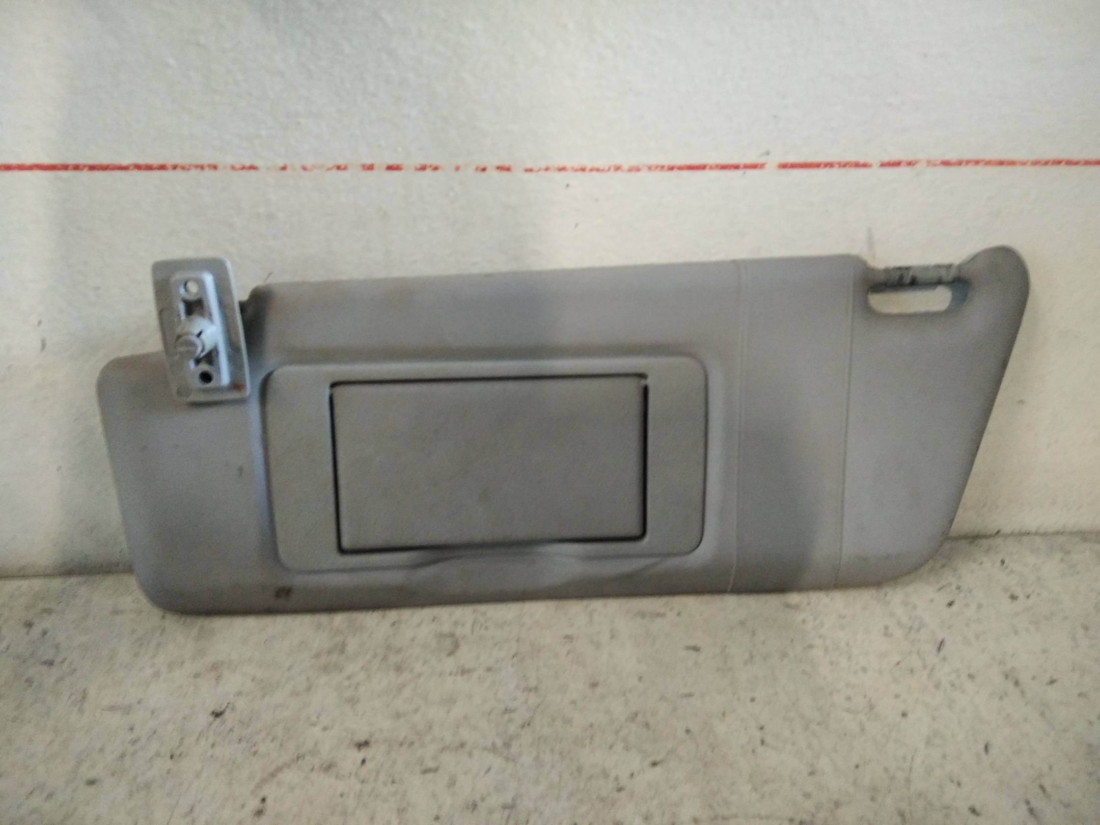 Aletta parasole parabrezza sx.