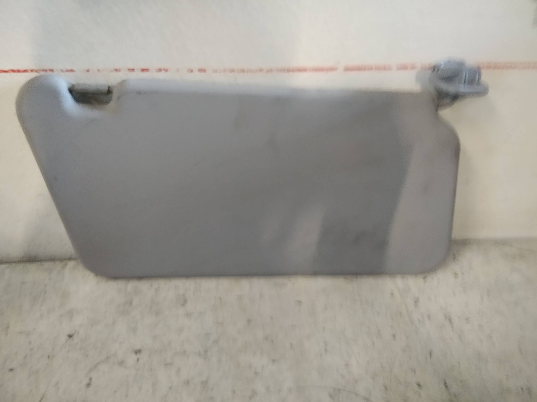 Aletta parasole parabrezza sx.