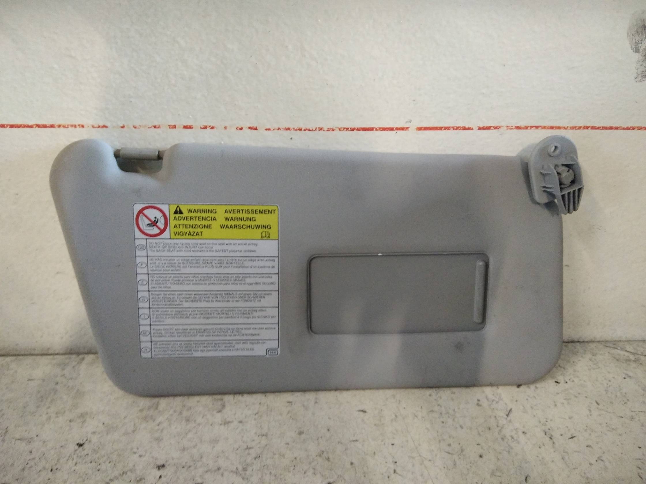 Aletta parasole parabrezza dx.