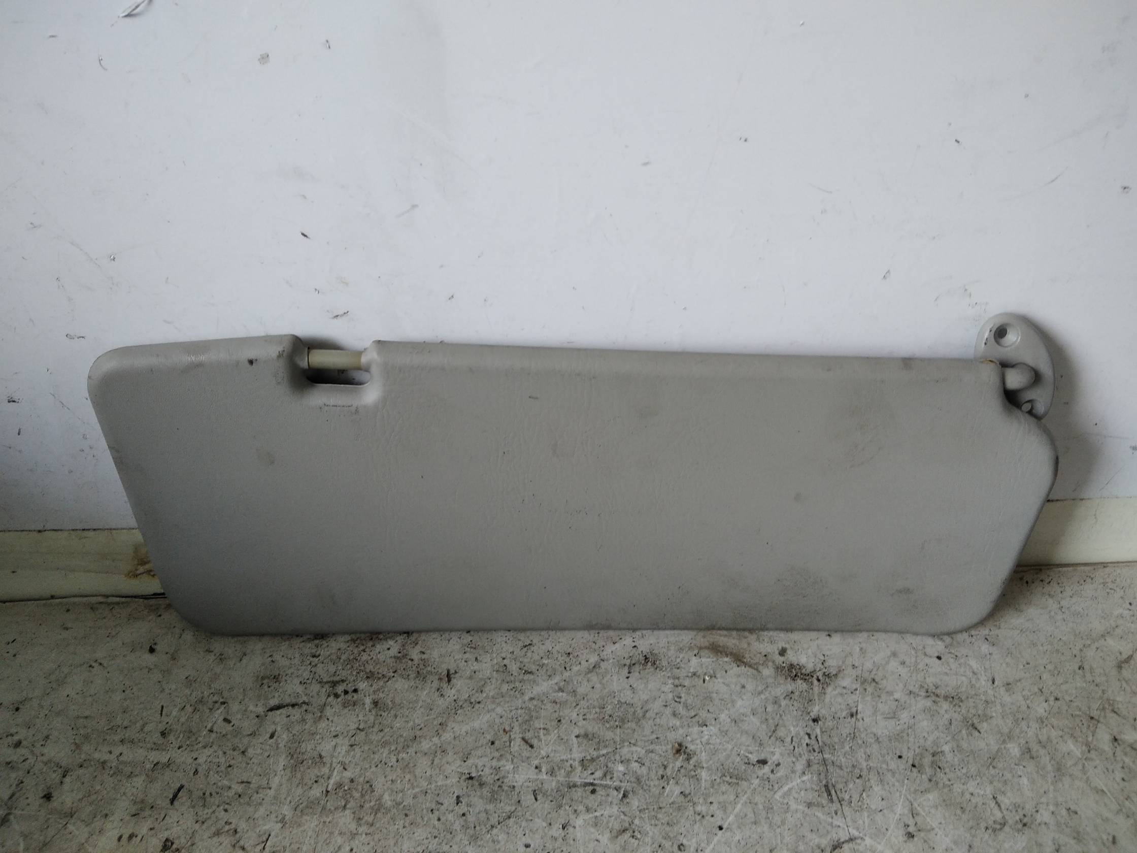 Aletta parasole parabrezza sx.