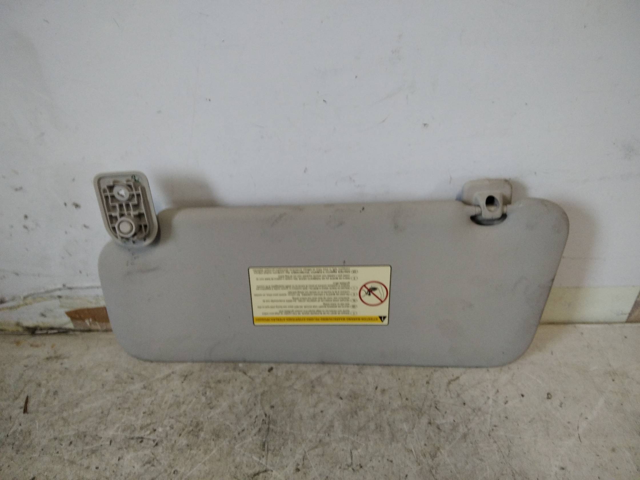 Aletta parasole parabrezza dx.