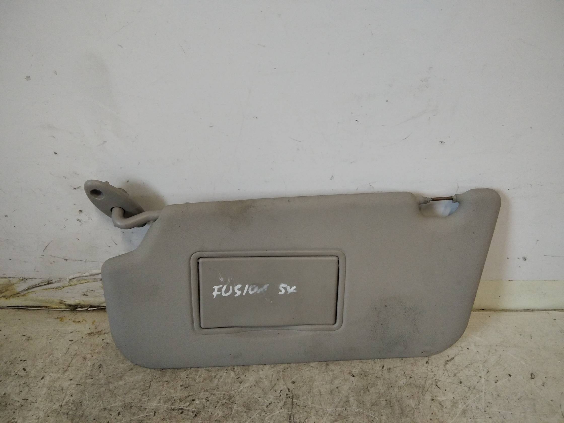 Aletta parasole parabrezza sx.