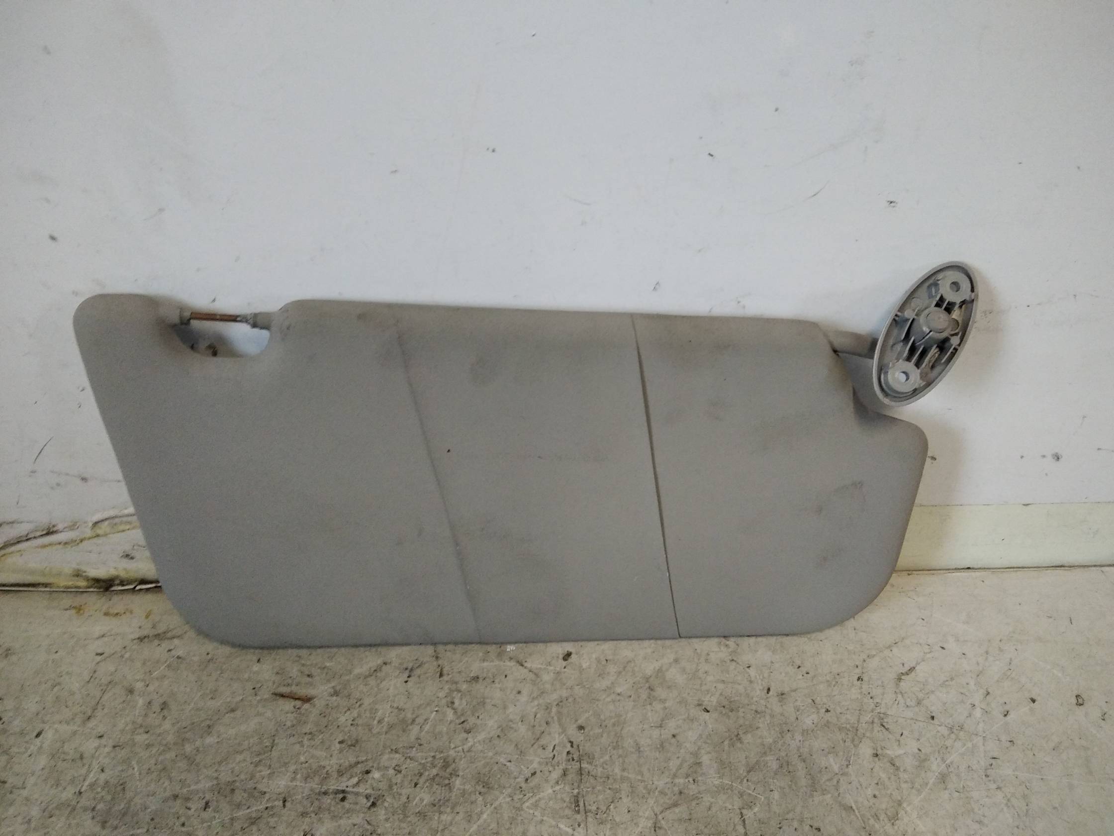 Aletta parasole parabrezza sx.