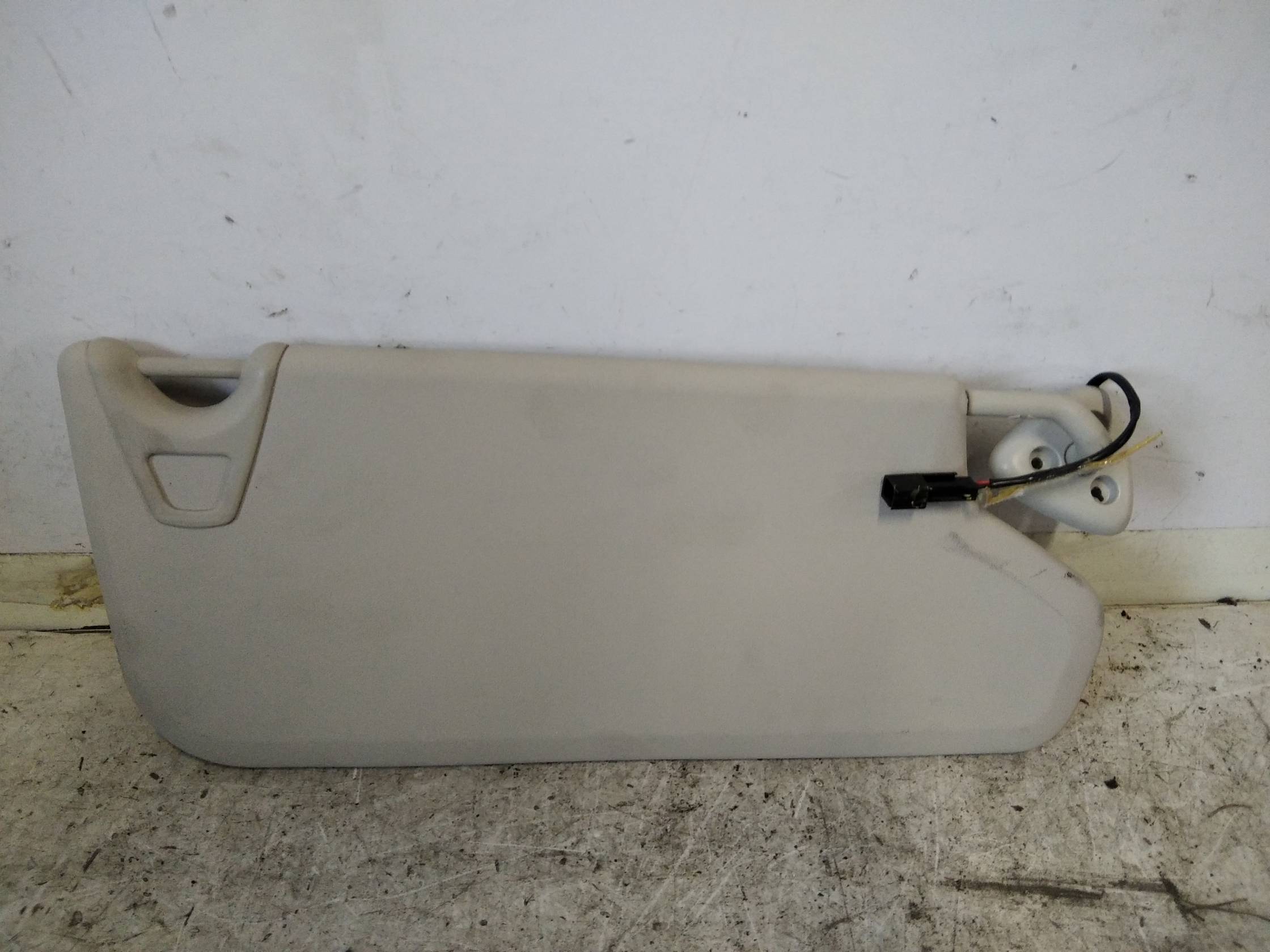 Aletta parasole parabrezza sx.