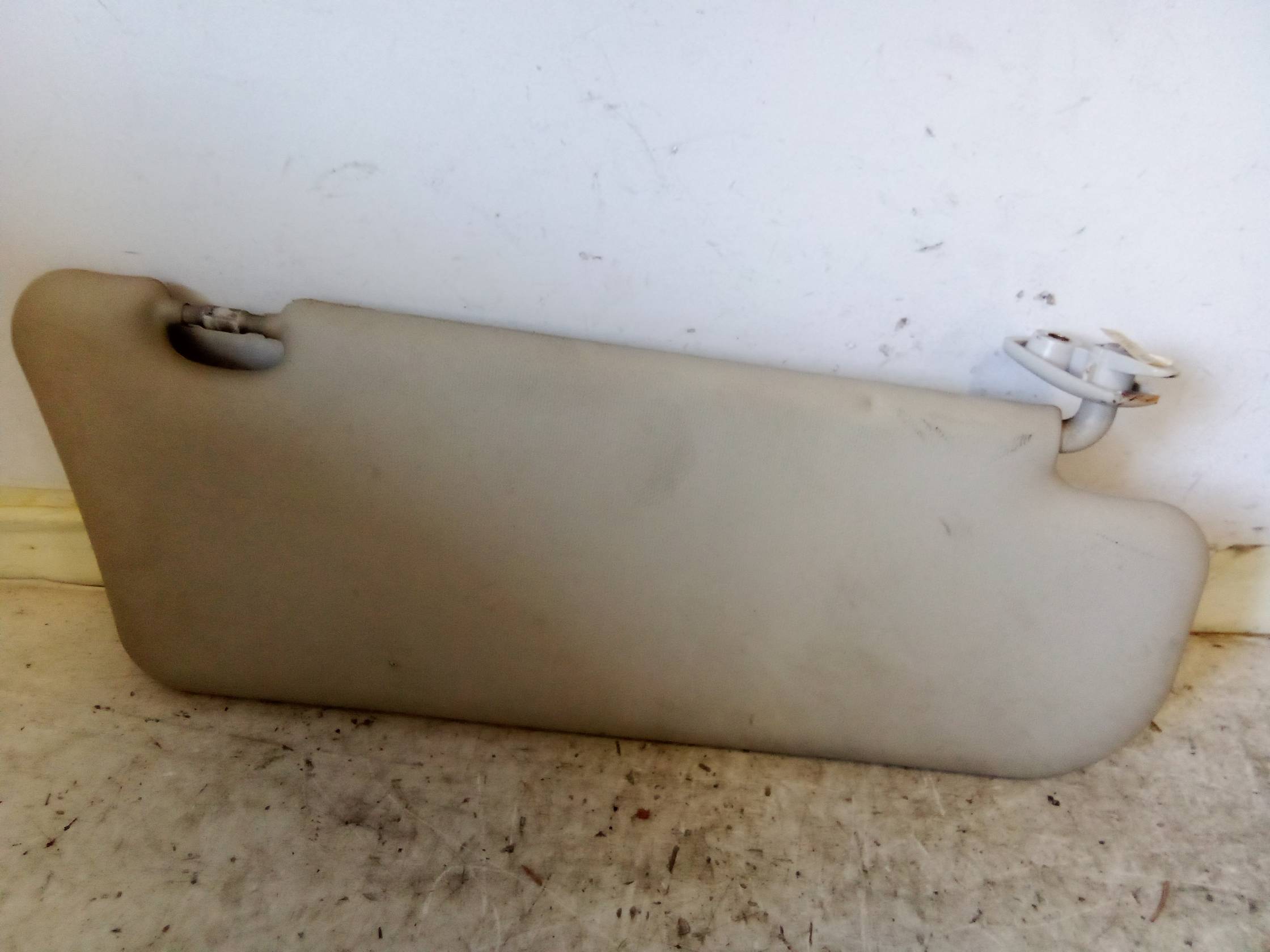 Aletta parasole parabrezza sx.