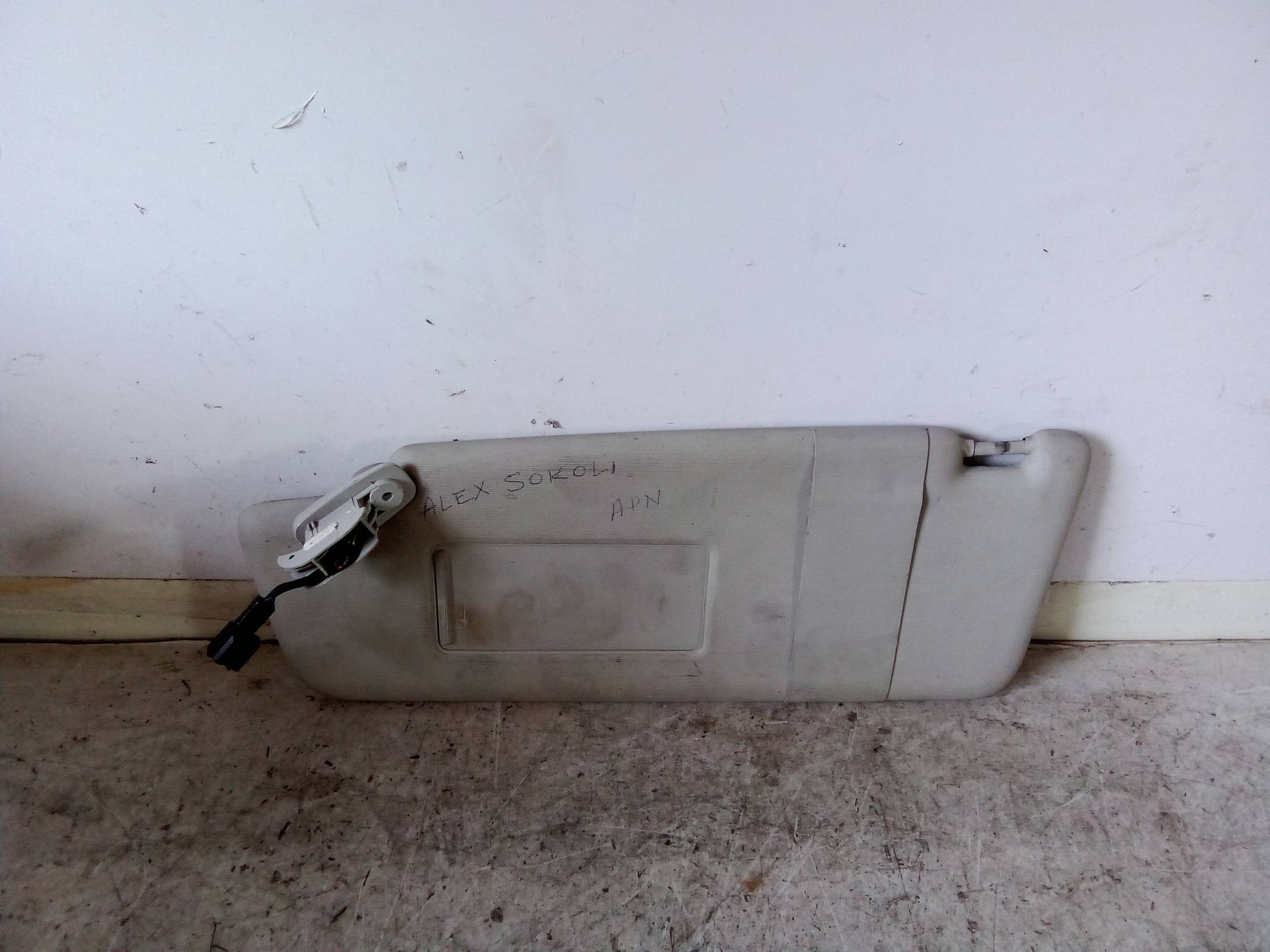 Aletta parasole parabrezza sx.