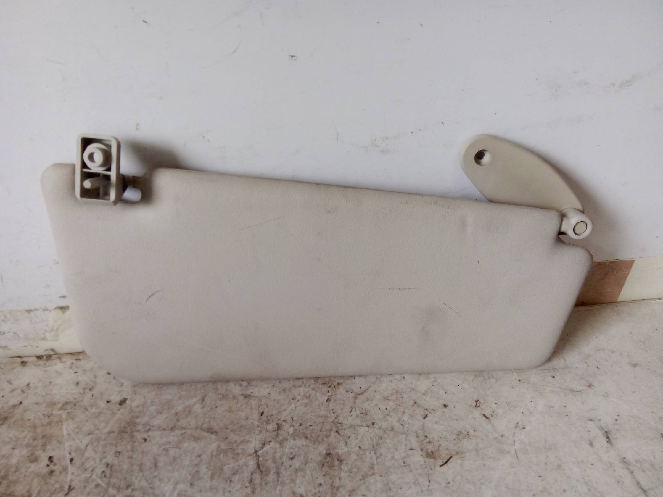 Aletta parasole parabrezza sx.