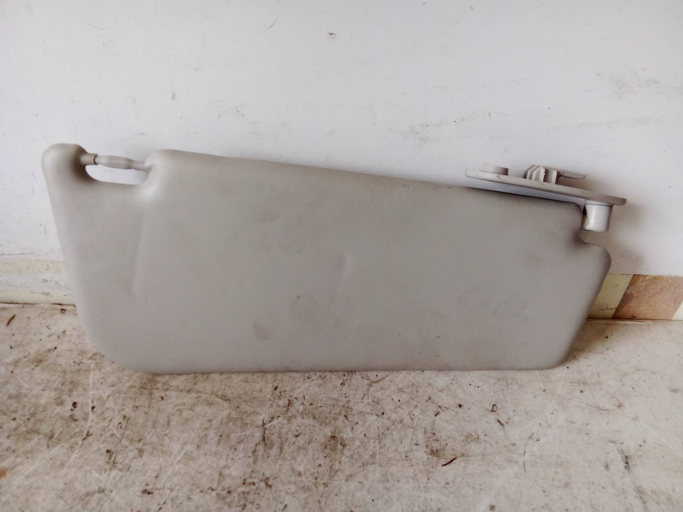 Aletta parasole parabrezza sx.