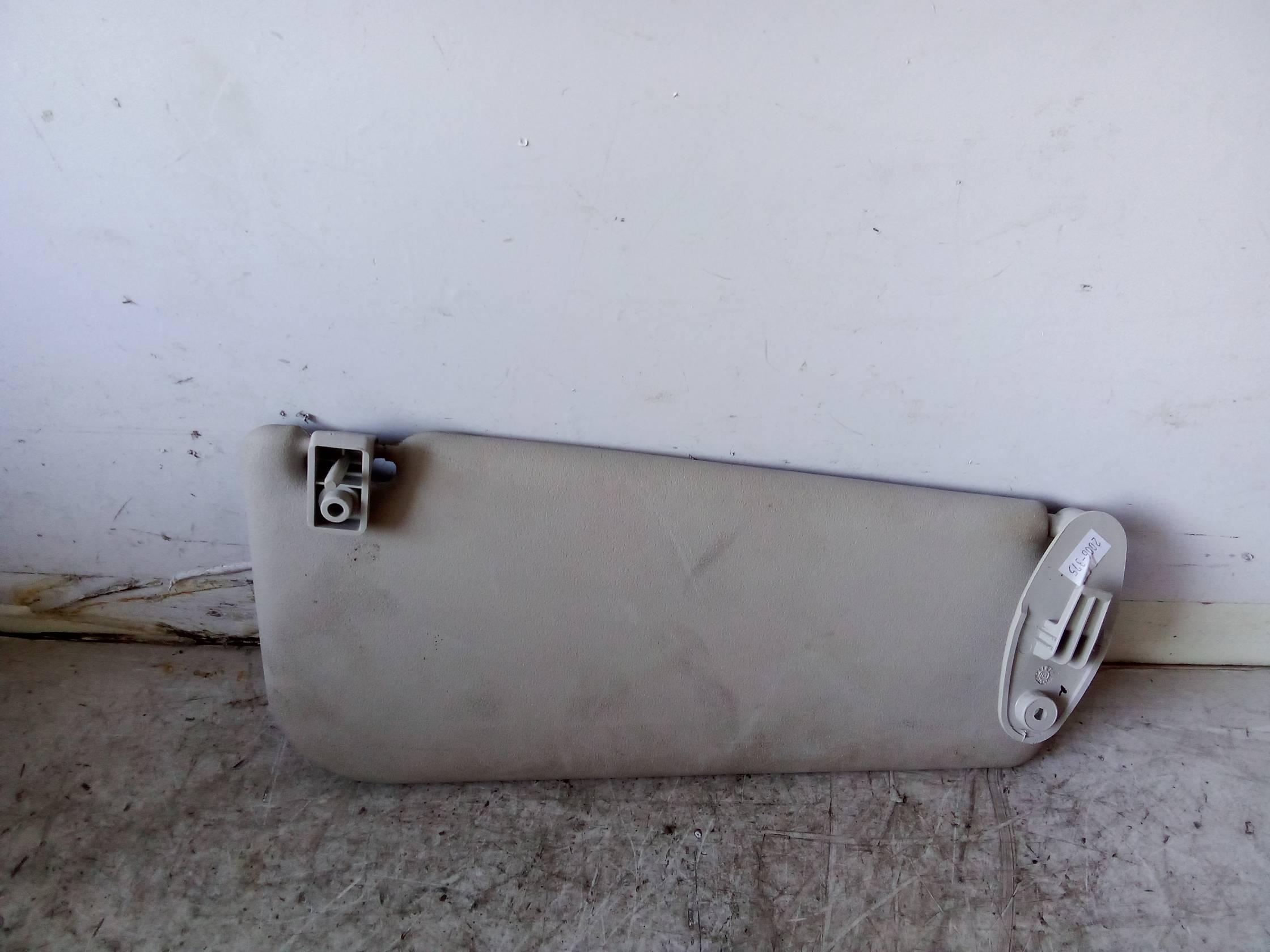 Aletta parasole parabrezza sx.