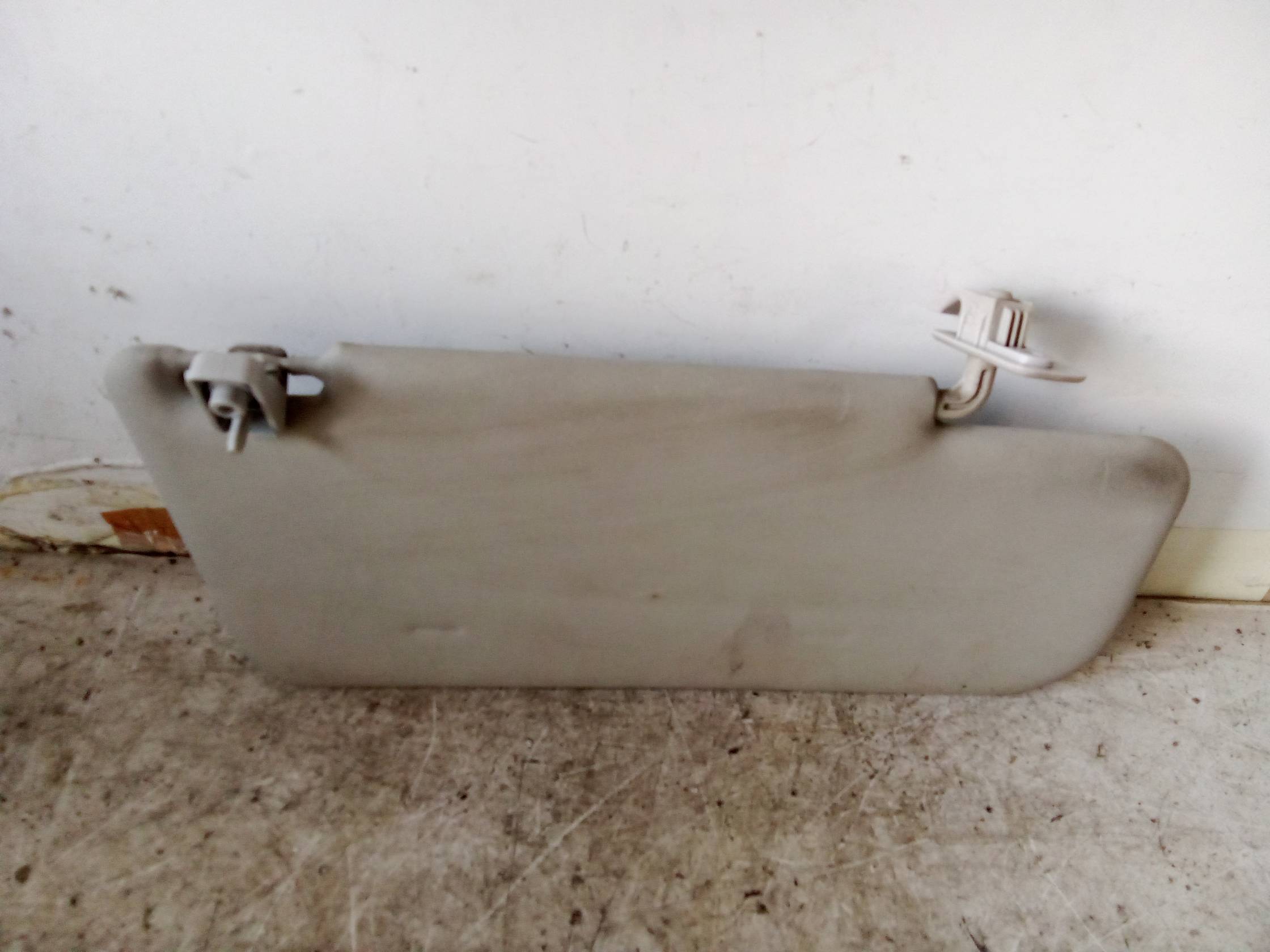 Aletta parasole parabrezza sx.