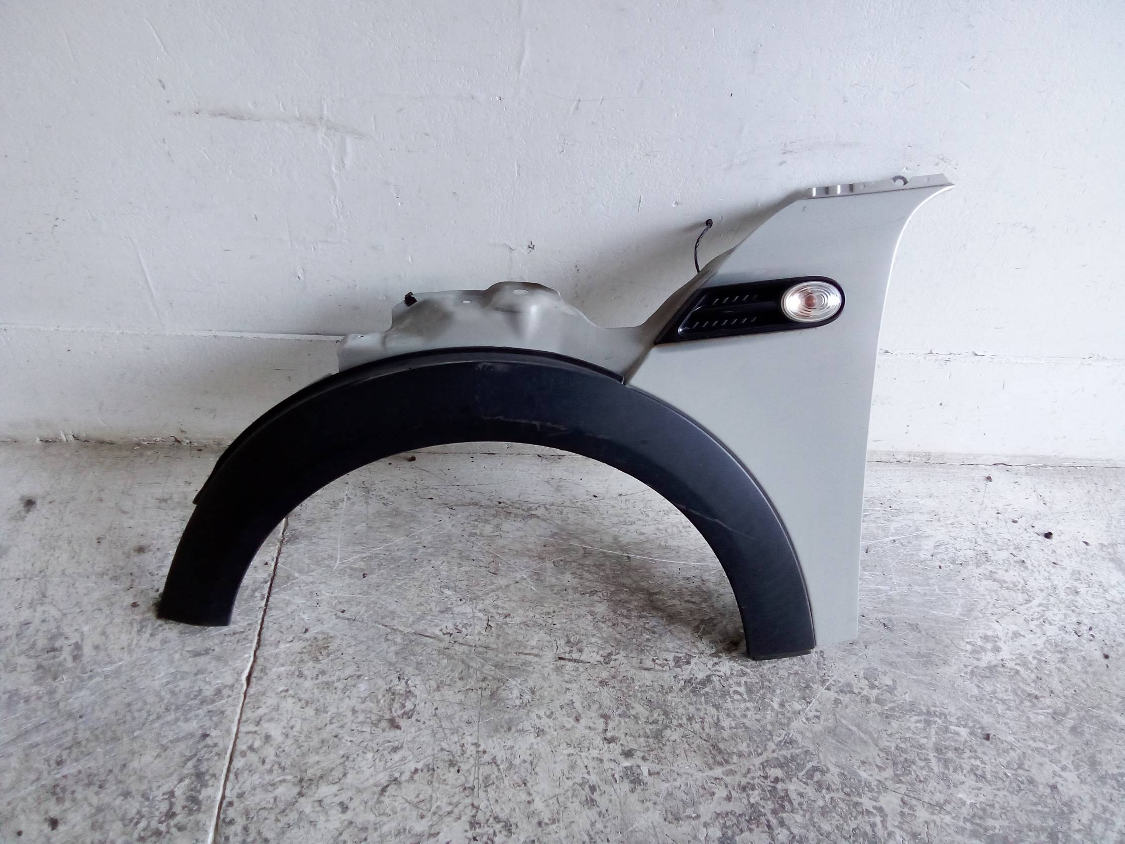 Parafango ant. sx.