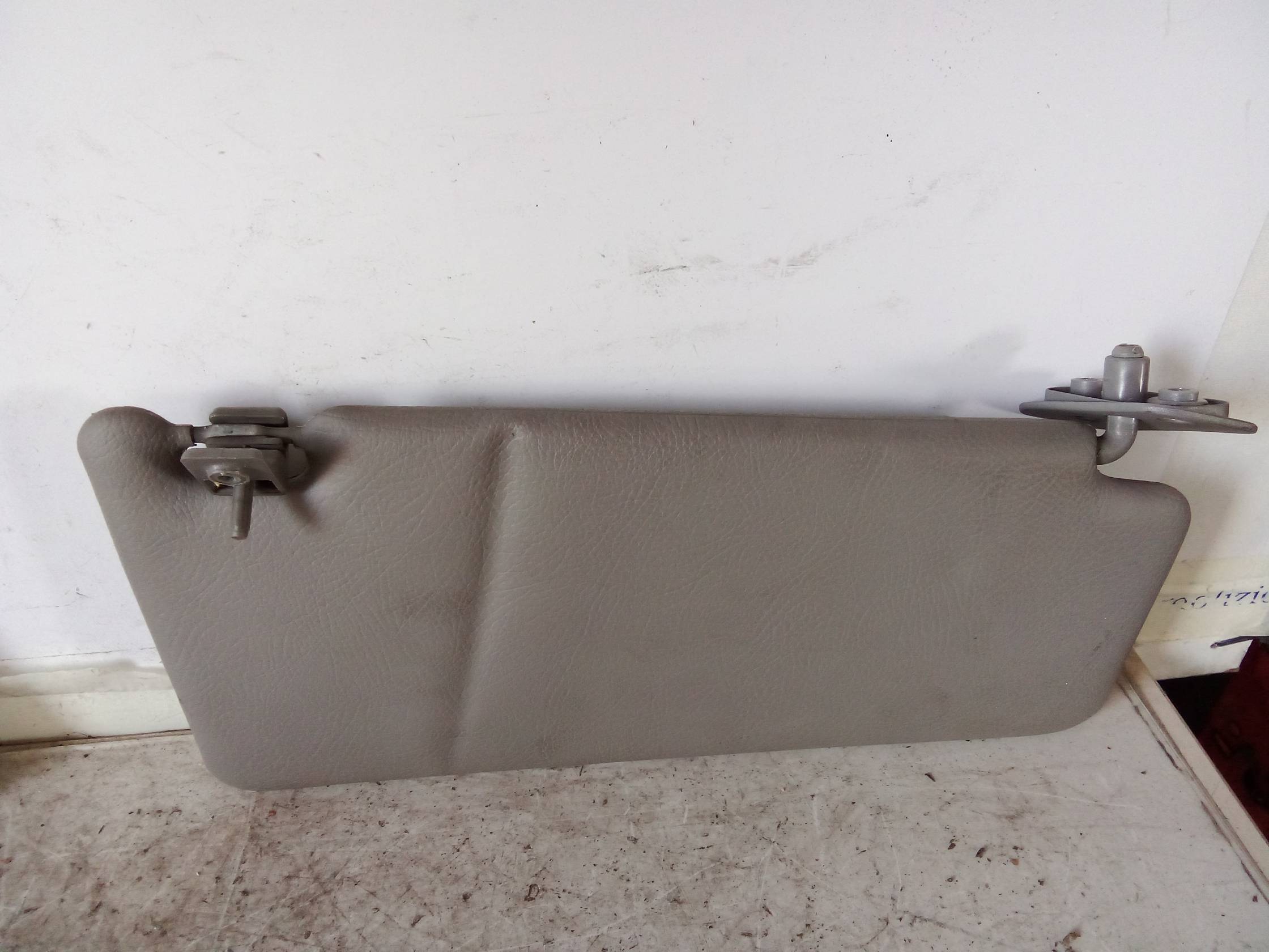 Aletta parasole parabrezza sx.