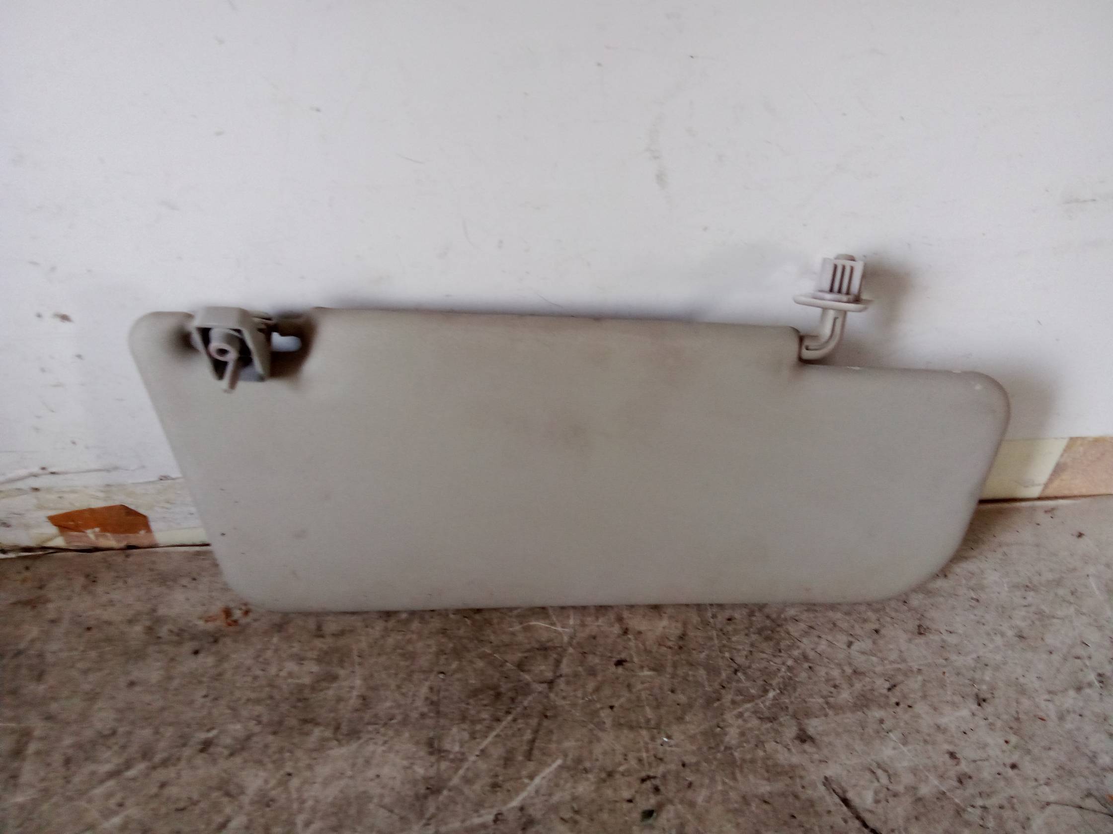 Aletta parasole parabrezza sx.