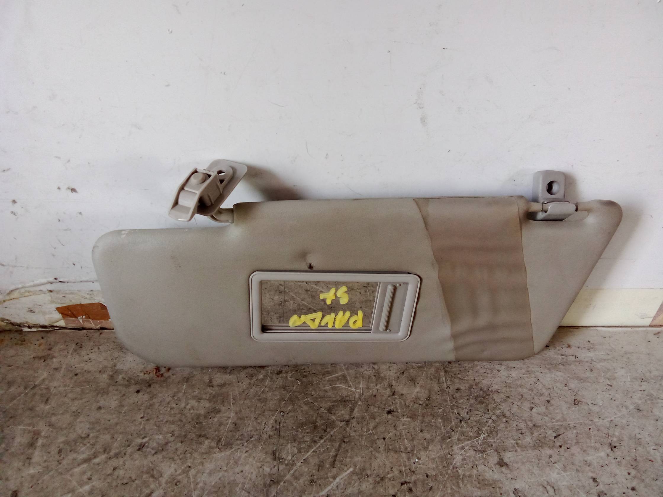 Aletta parasole parabrezza sx.