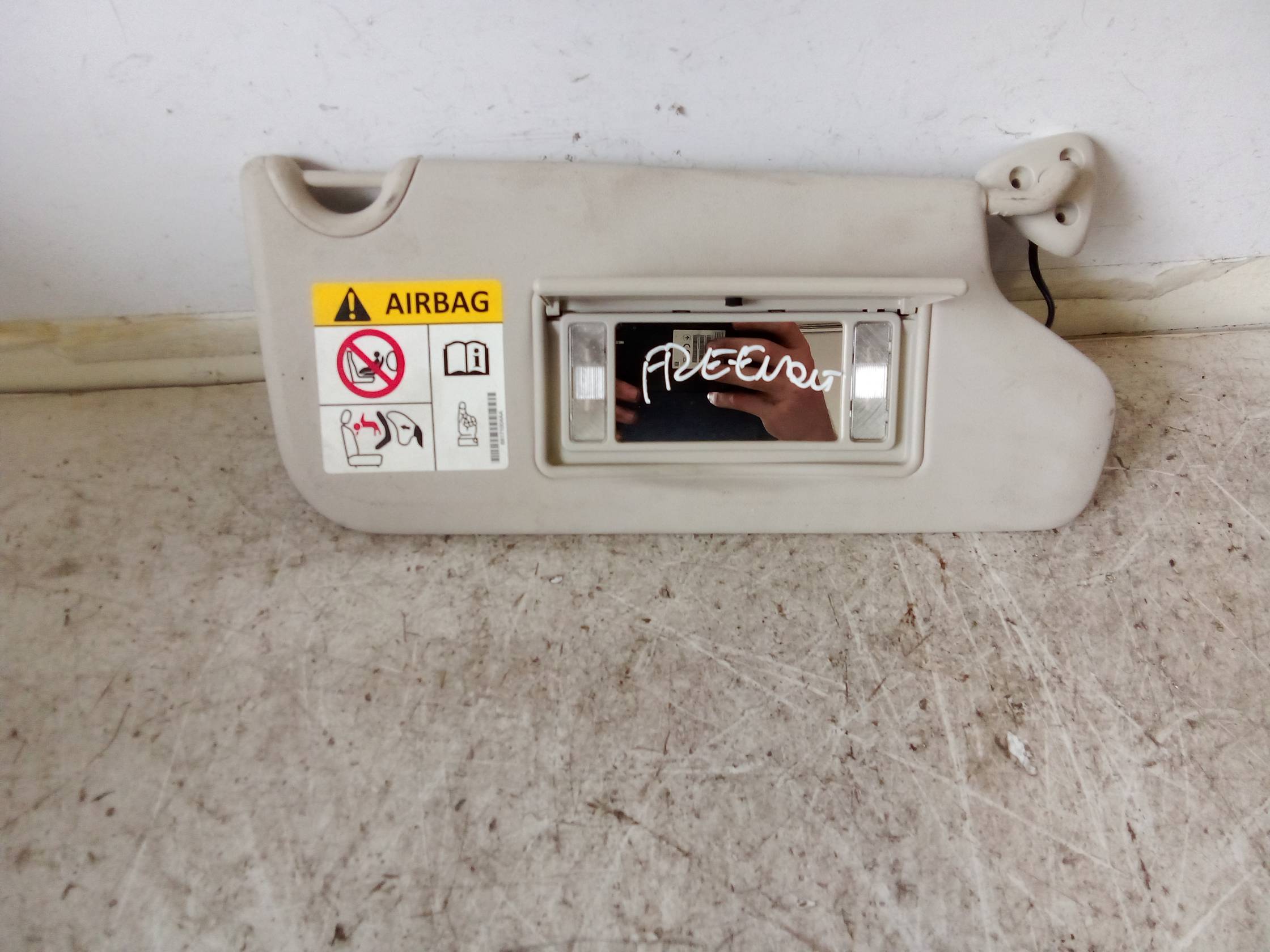 Aletta parasole parabrezza dx.