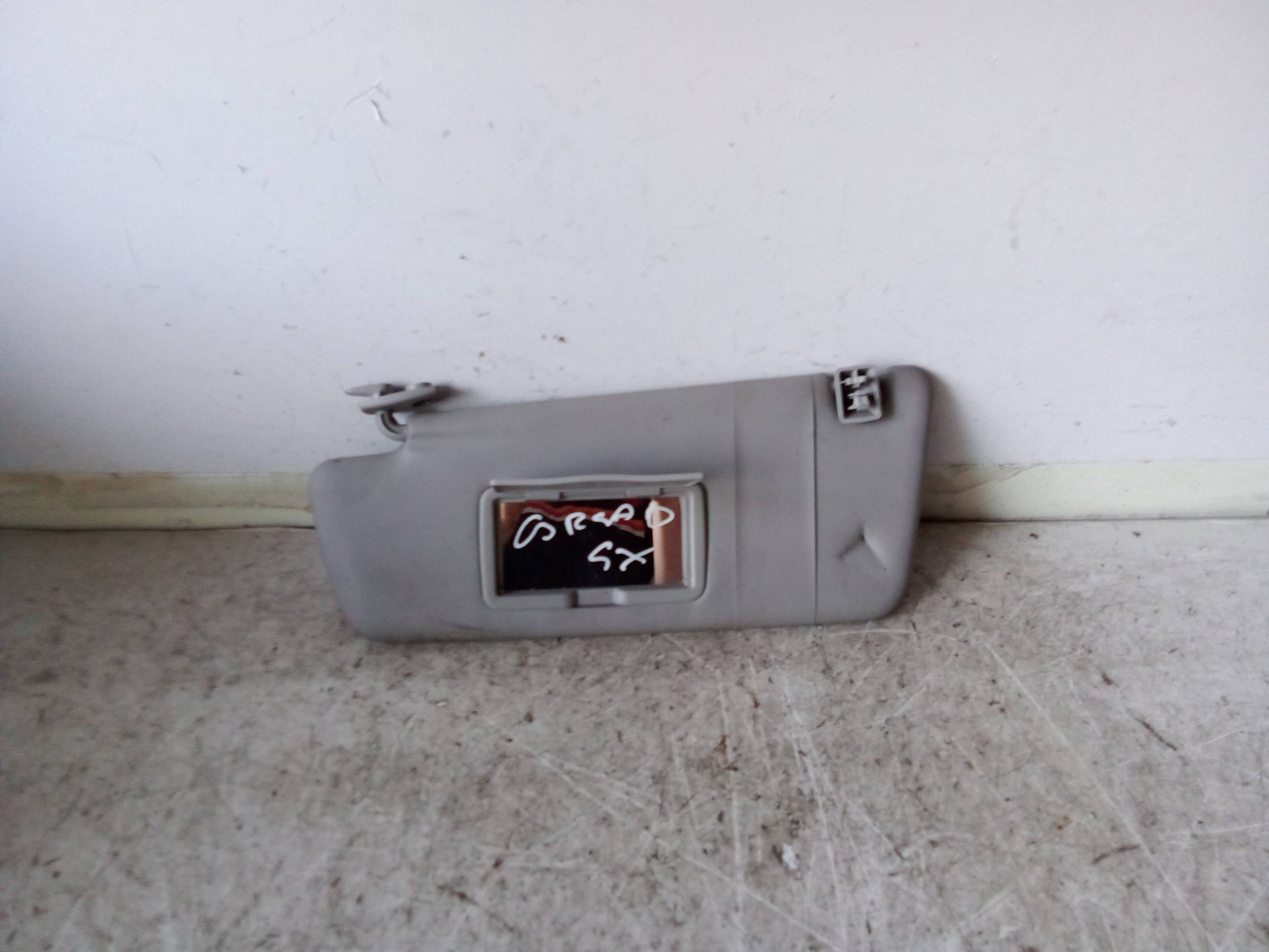 Aletta parasole parabrezza sx.