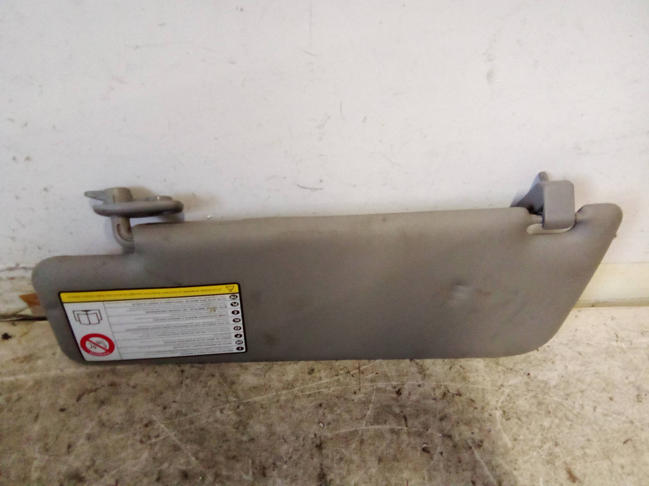 Aletta parasole parabrezza dx.