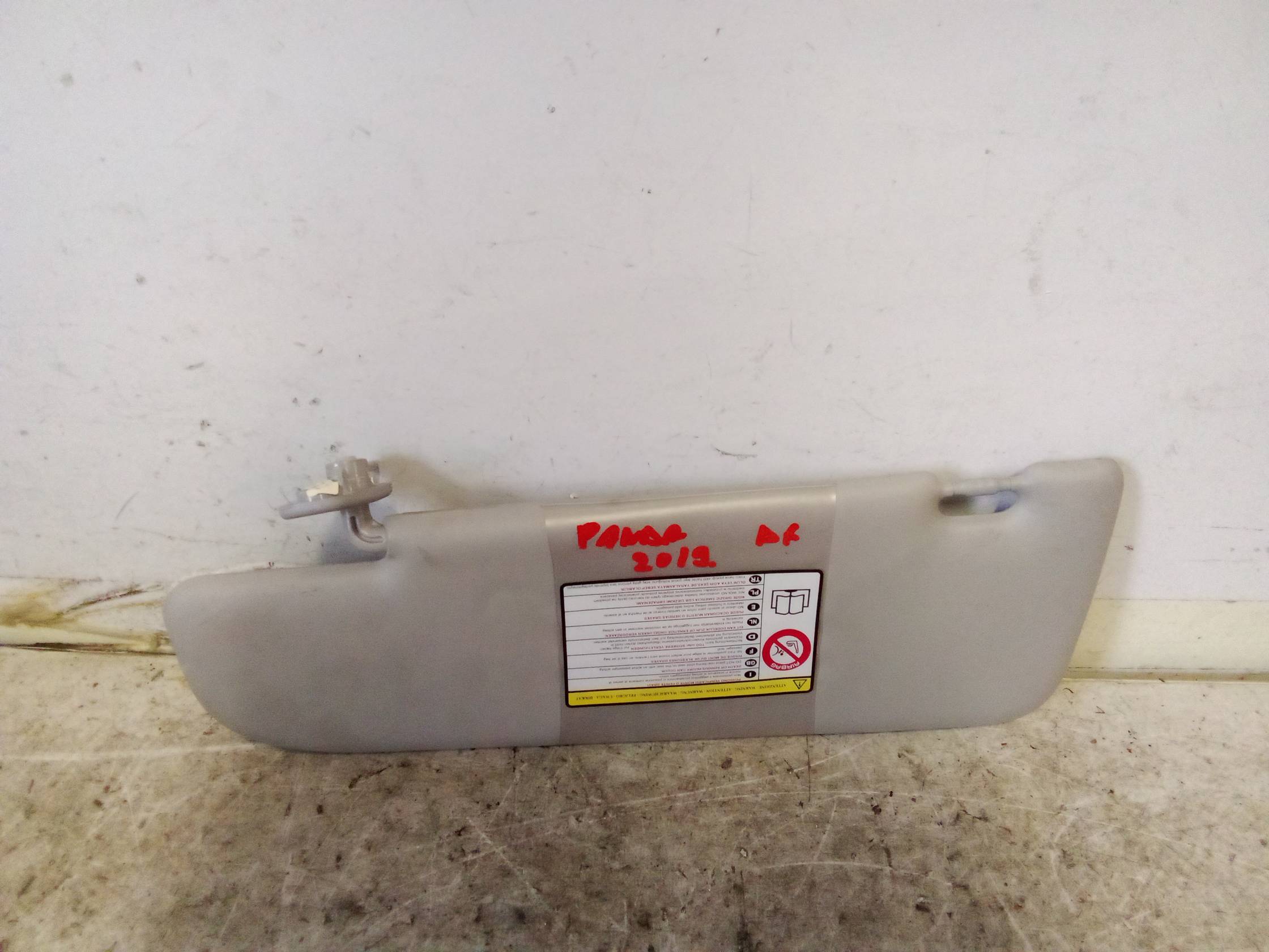 Aletta parasole parabrezza dx.