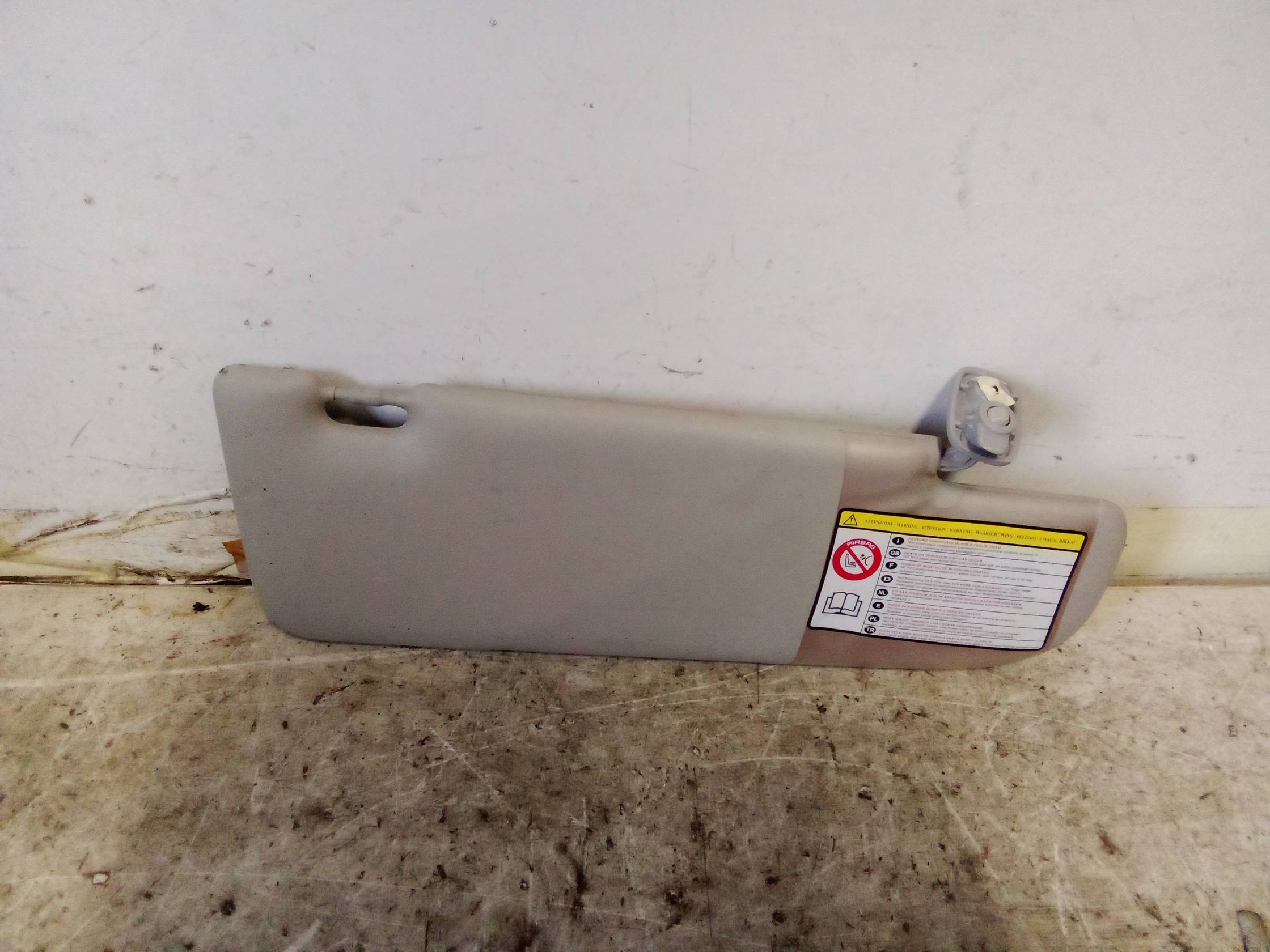 Aletta parasole parabrezza dx.