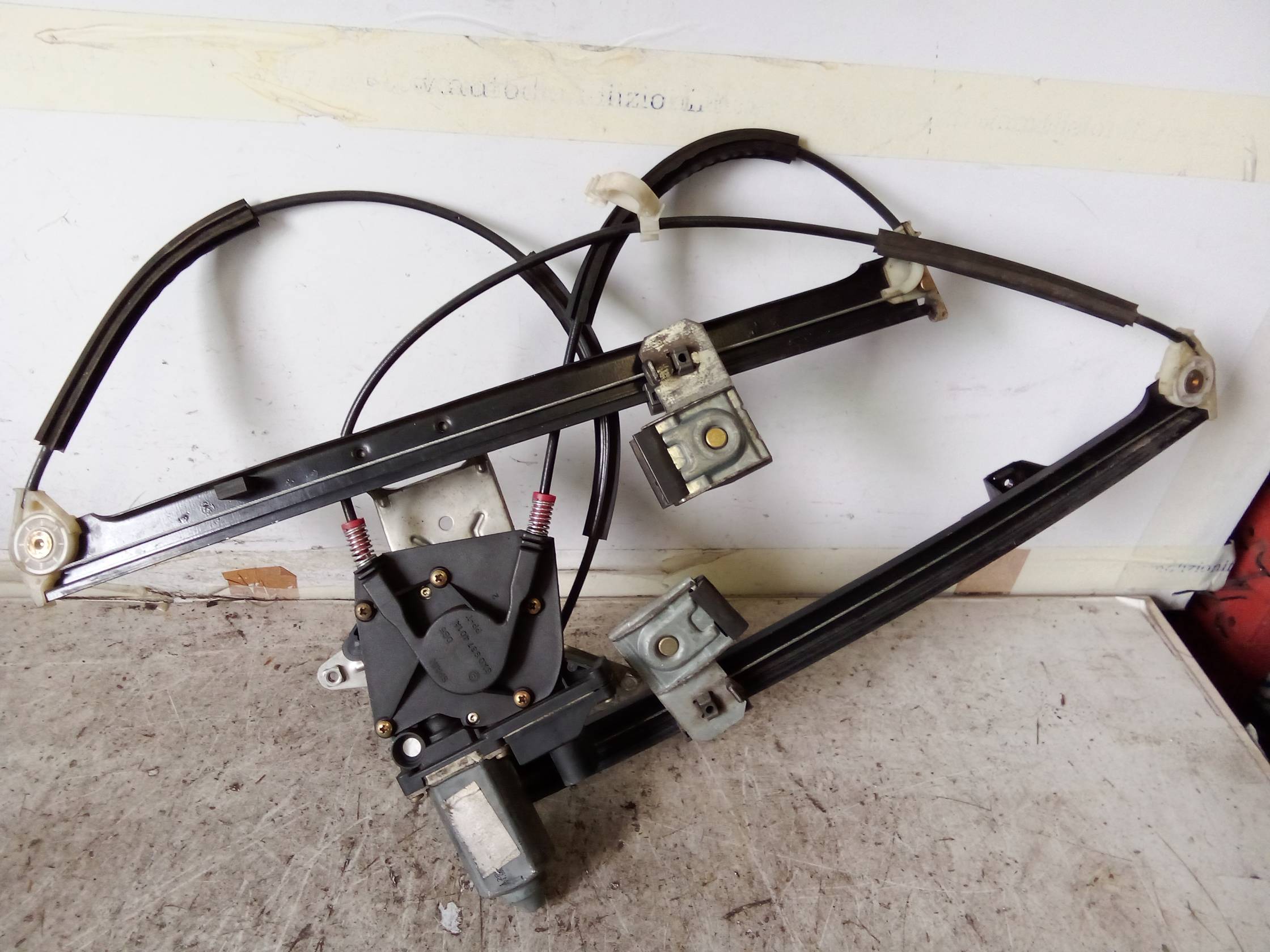 Alzacristallo elettr. porta ant. sx.