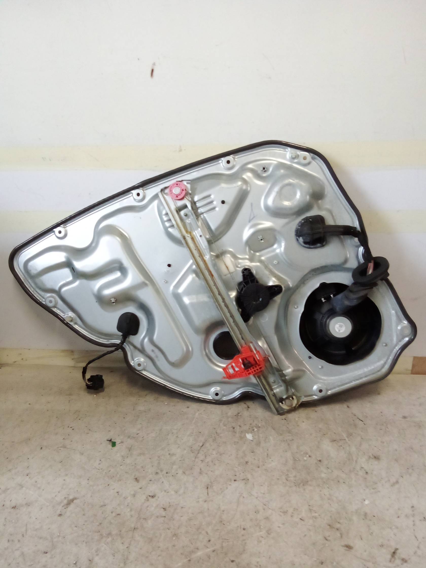 Alzacristallo elettr. porta post. con motorino dx.