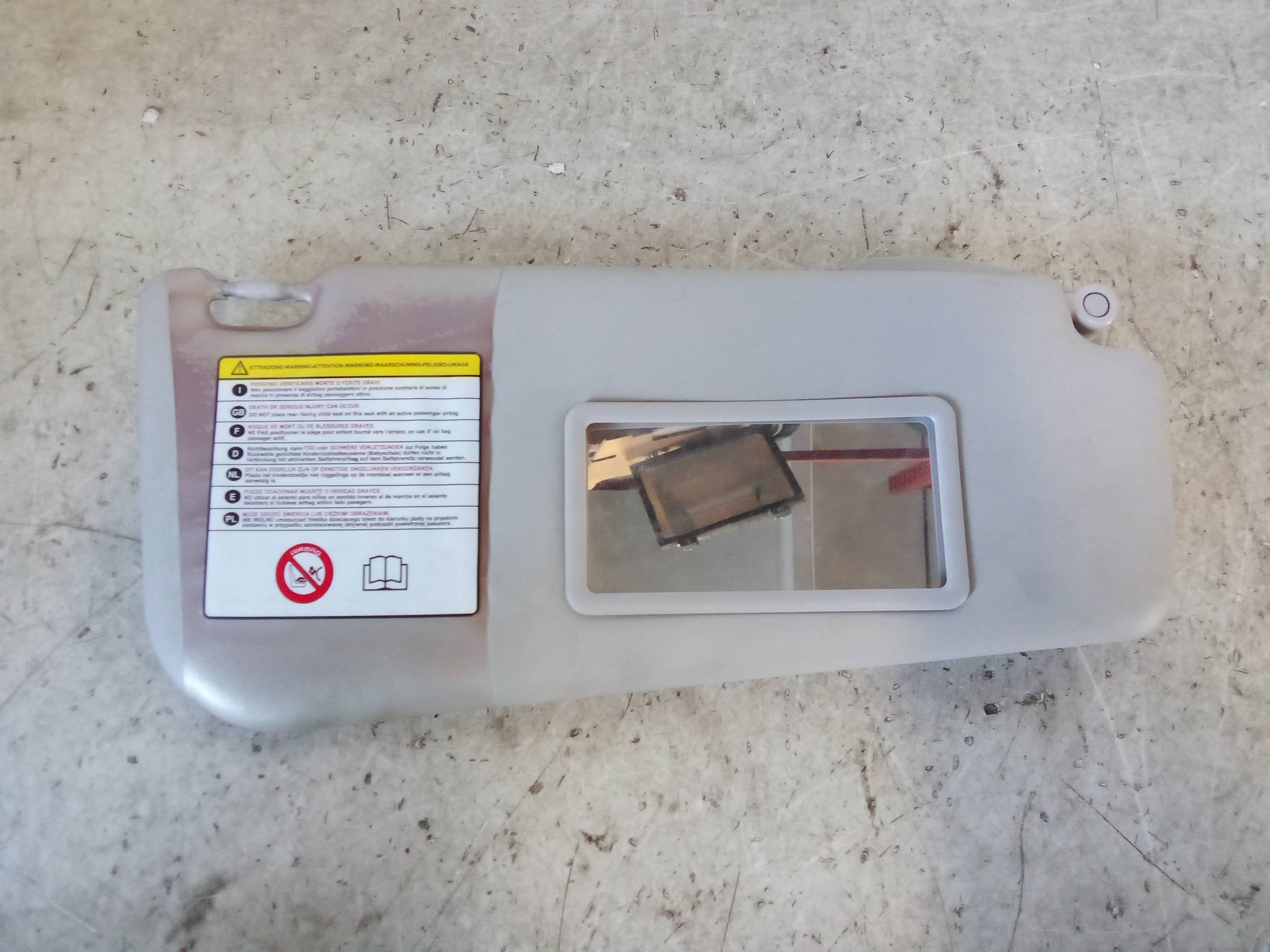 Aletta parasole parabrezza dx.