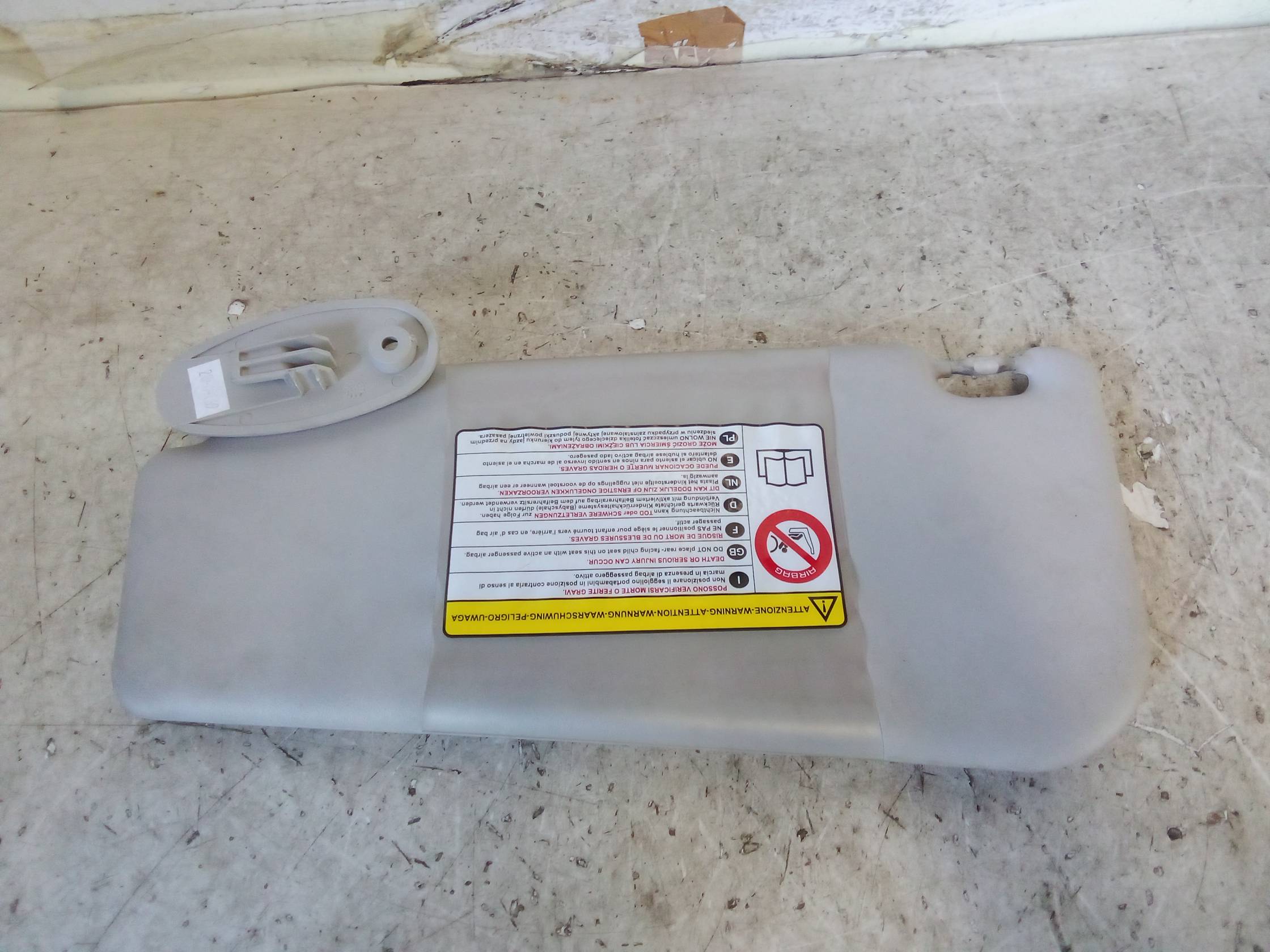 Aletta parasole parabrezza dx.